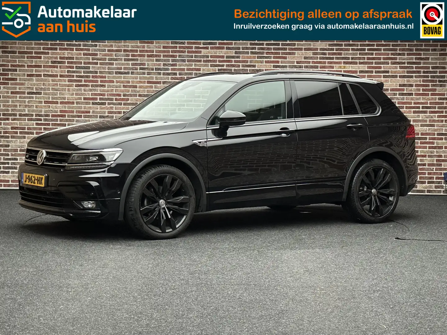 Volkswagen Tiguan 1.5 TSI R-LINE PANORAMA HEAD-UP VERWARMDE VOORSTOE Schwarz - 1