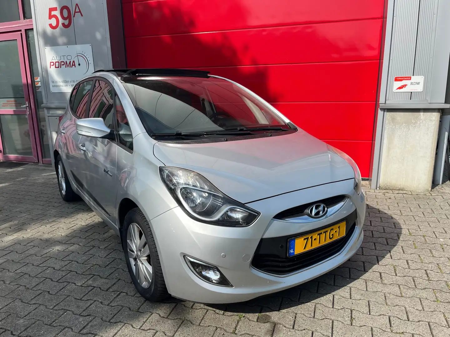 Hyundai iX20 1.4i i-Vision 90pk / Open schuif- kantel dak / Tre Gris - 1