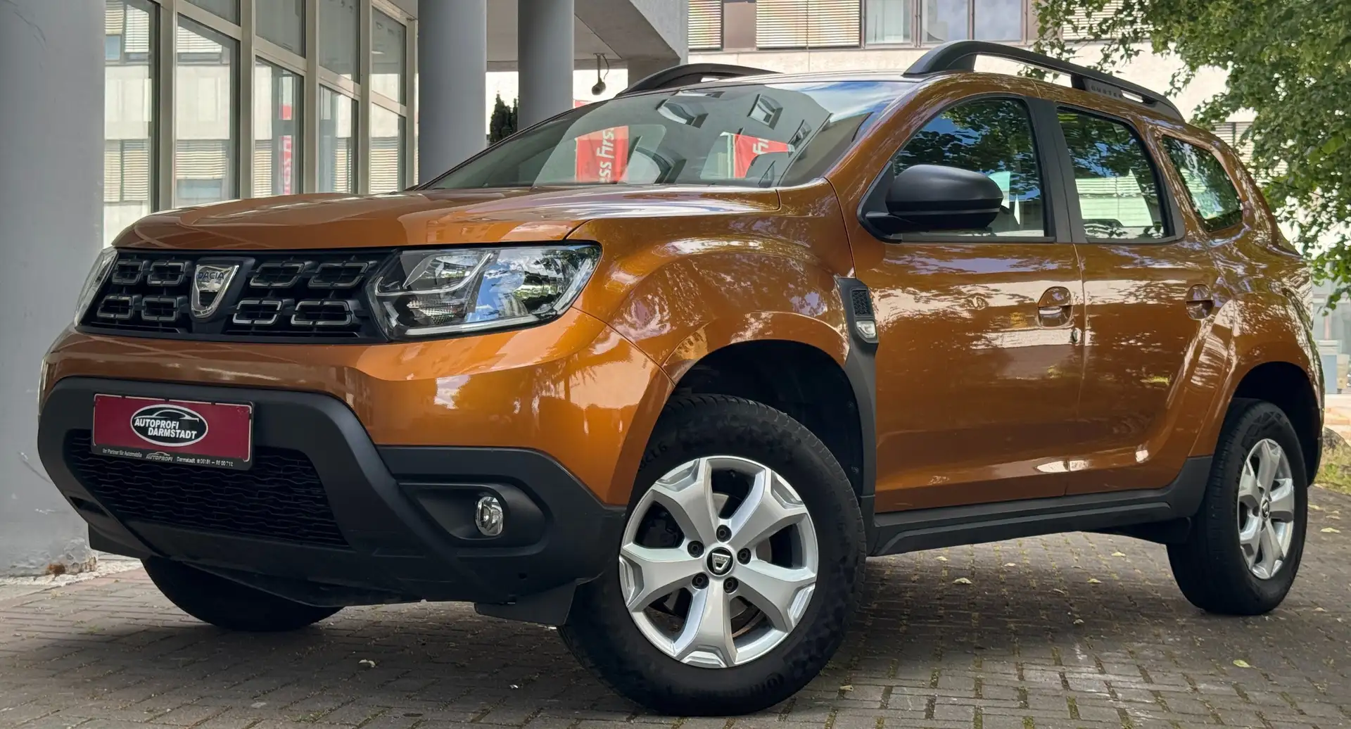 Dacia Duster TÜV AU NEU*SITZ-HZ*TEMPOMAT*PDC*KLIMA Orange - 1