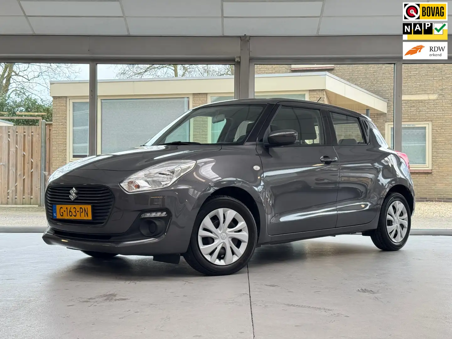 Suzuki Swift 1.2 Comfort Grijs - 1