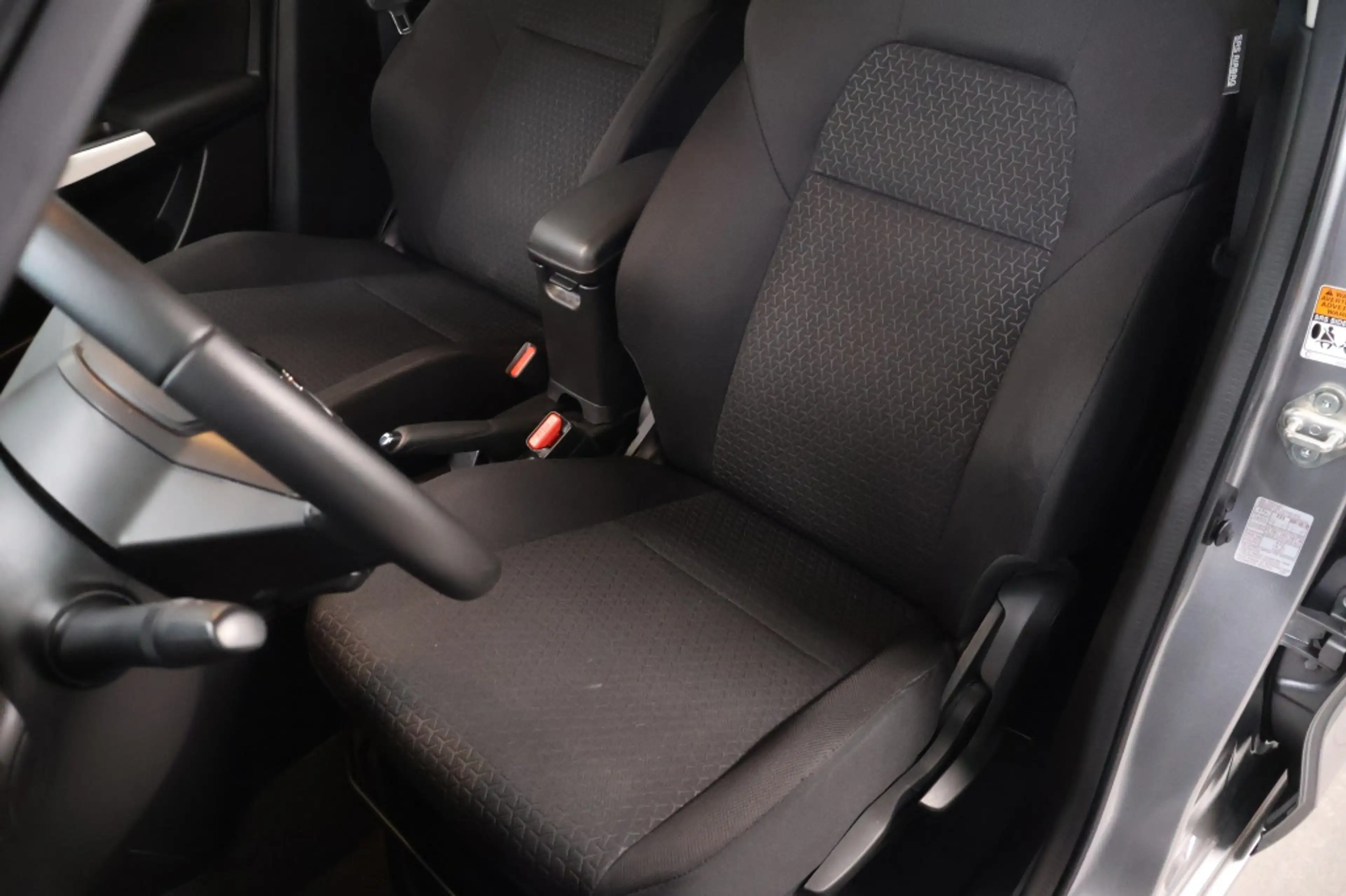 Suzuki Swift 1.0 Stijl Smart Hybrid — photo 11