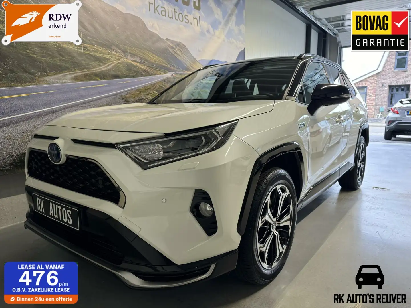 Toyota RAV 4 2.5 Plug-in Hybrid AWD Bi-Tone Plus / Trekhaak! Wit - 1