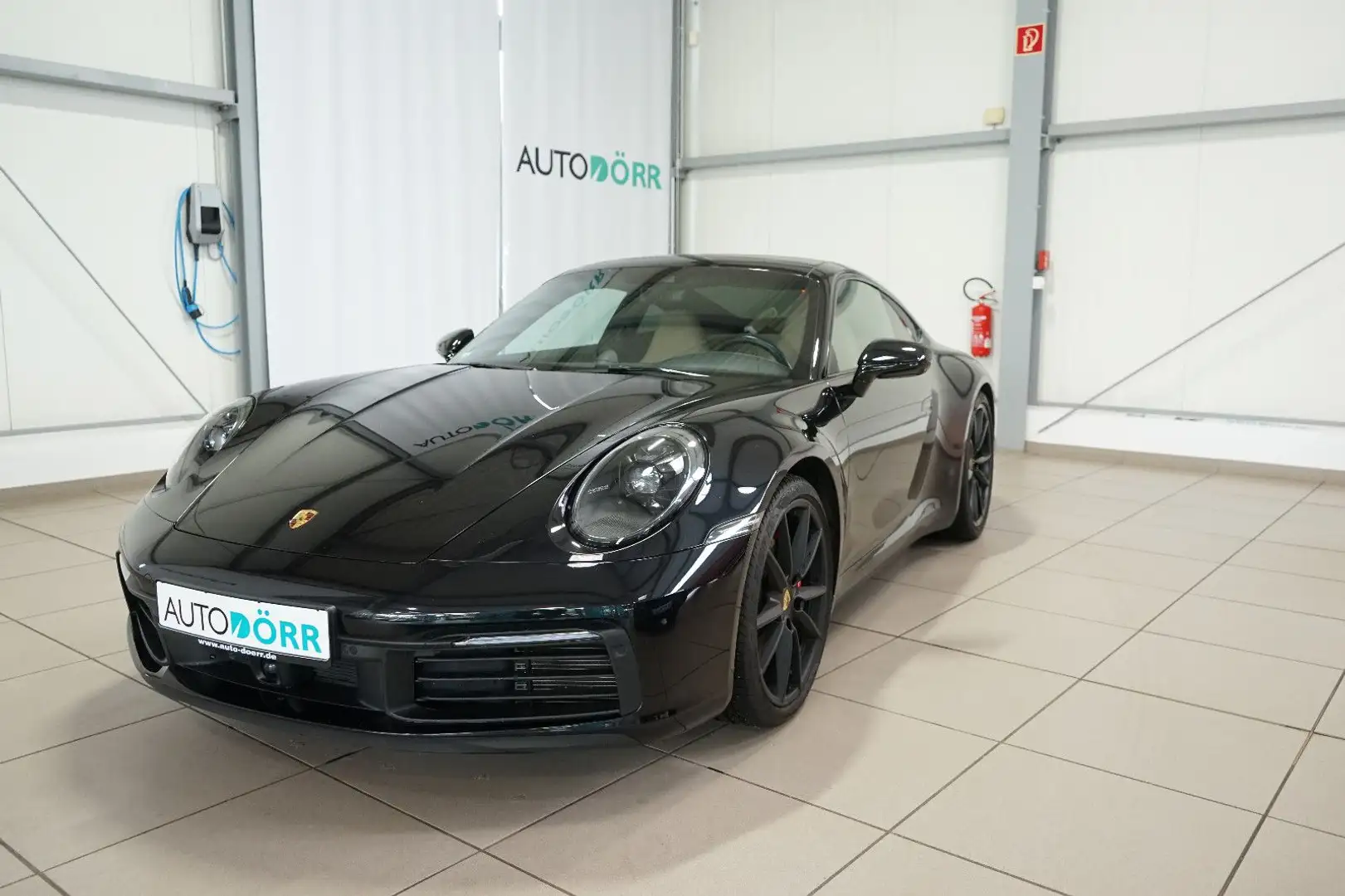 Porsche 992 911/992 Carrera 4S Coupé Approved bis 04.26 Zwart - 1