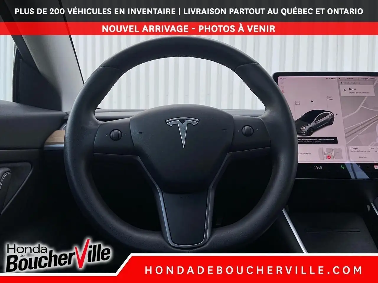Tesla Model 3 photo Tesla Model 3