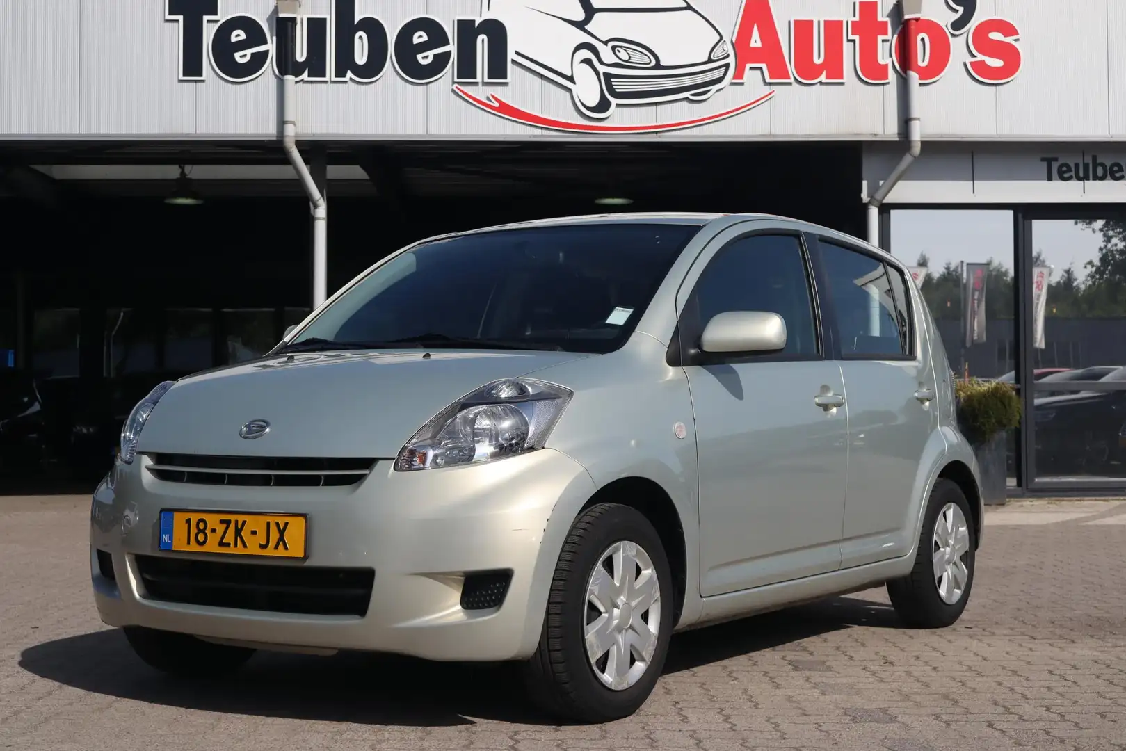 Daihatsu Sirion 2 1.0-12V Premium | Elektrisch pakket | APK 03-202 Beige - 1