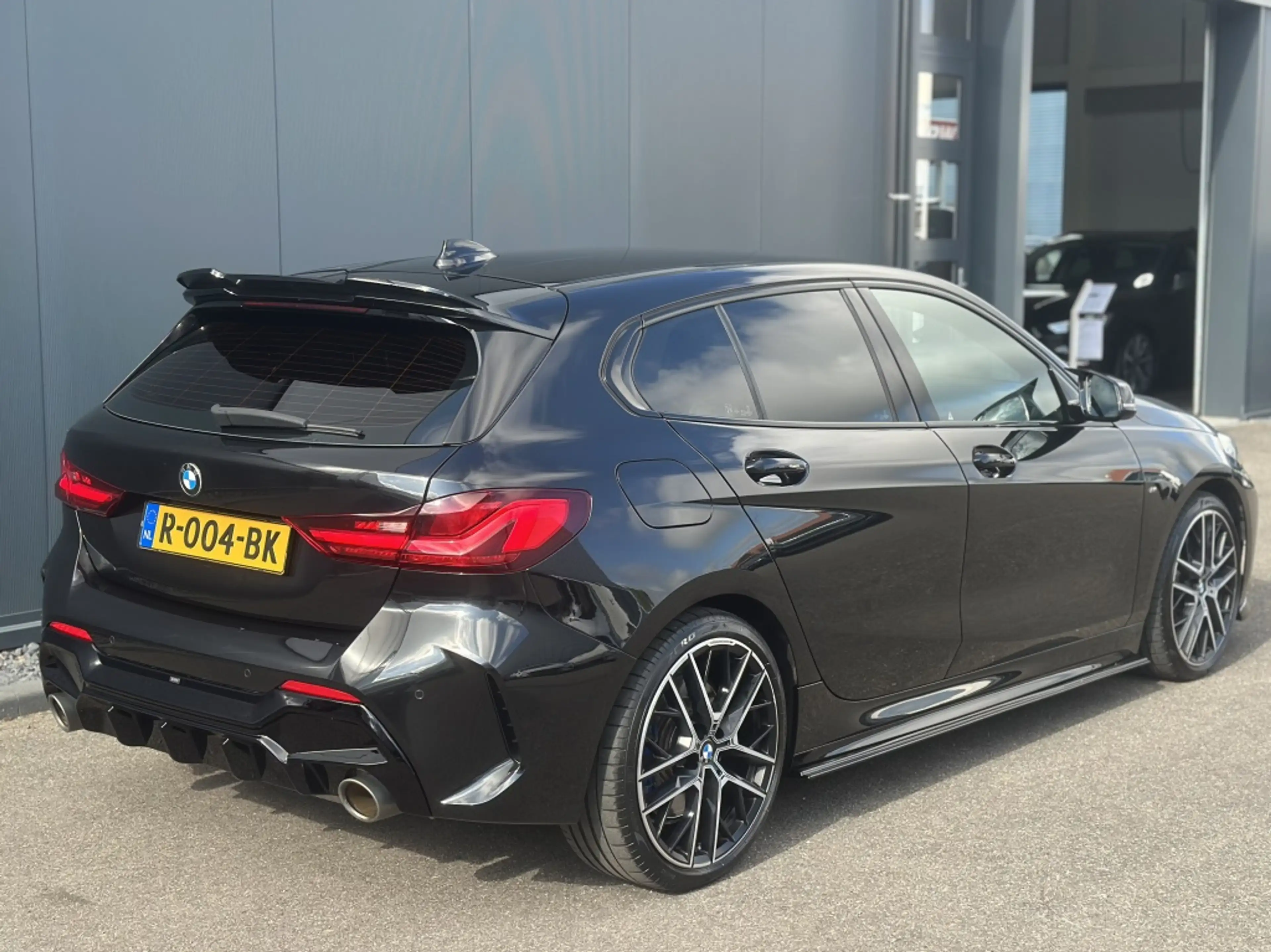 BMW 135 1-serie M135i xDrive High Executive — photo 2