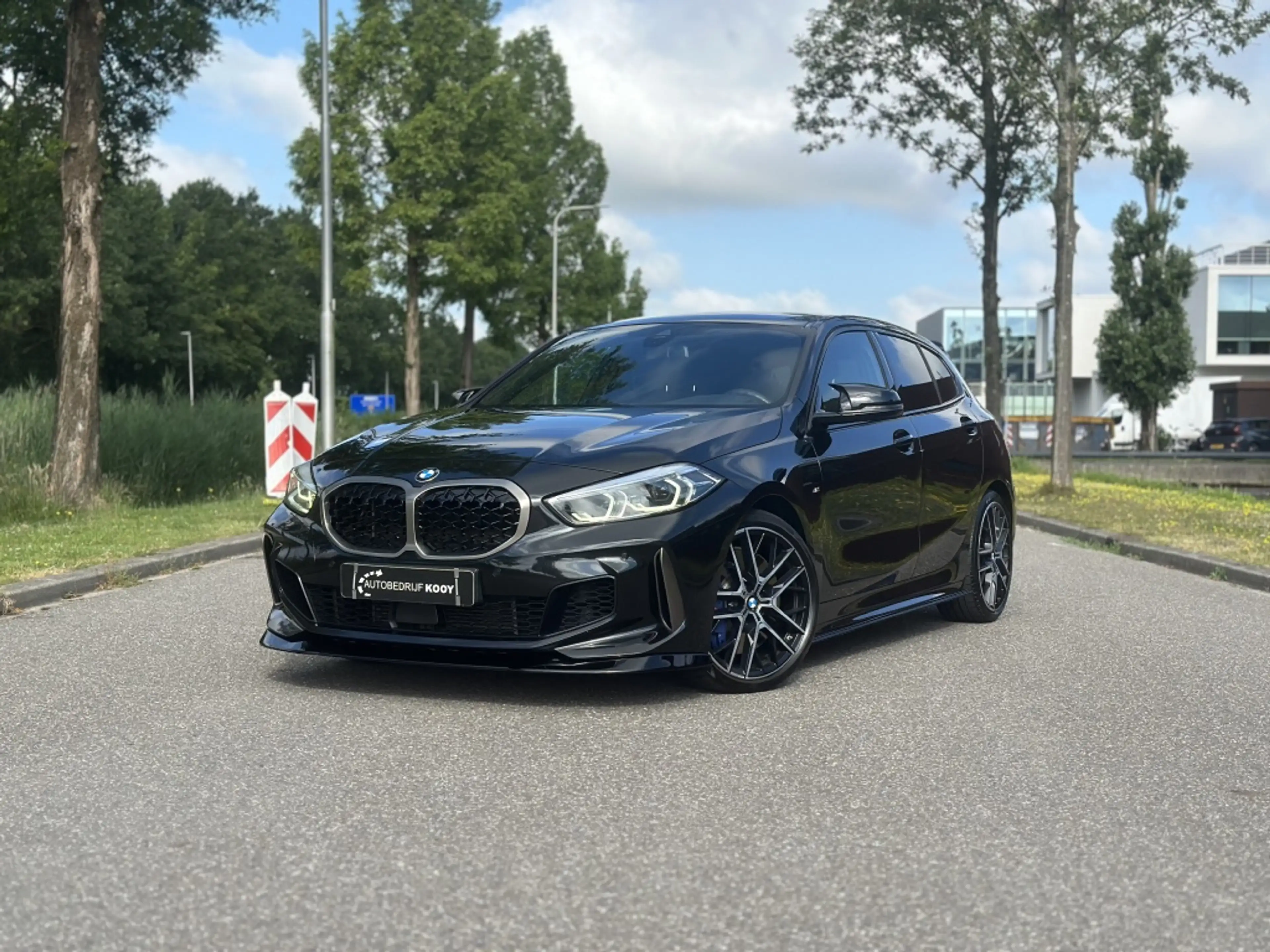 BMW 135 1-serie M135i xDrive High Executive — photo 41