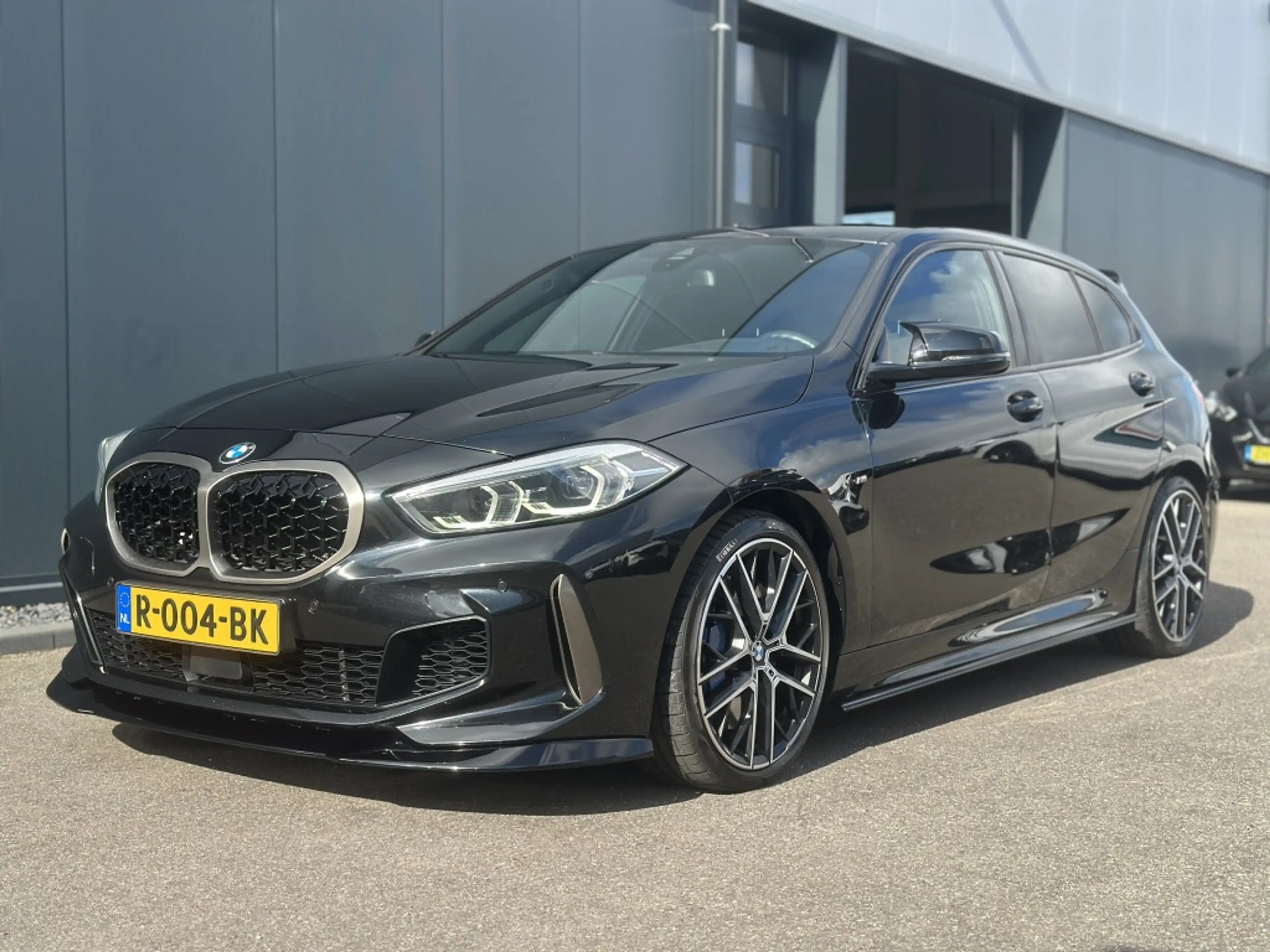 BMW 135 1-serie M135i xDrive High Executive — photo 13
