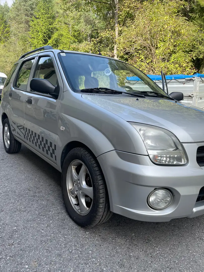 Subaru Justy Justy G3X 1,3 4WD Срібний - 1