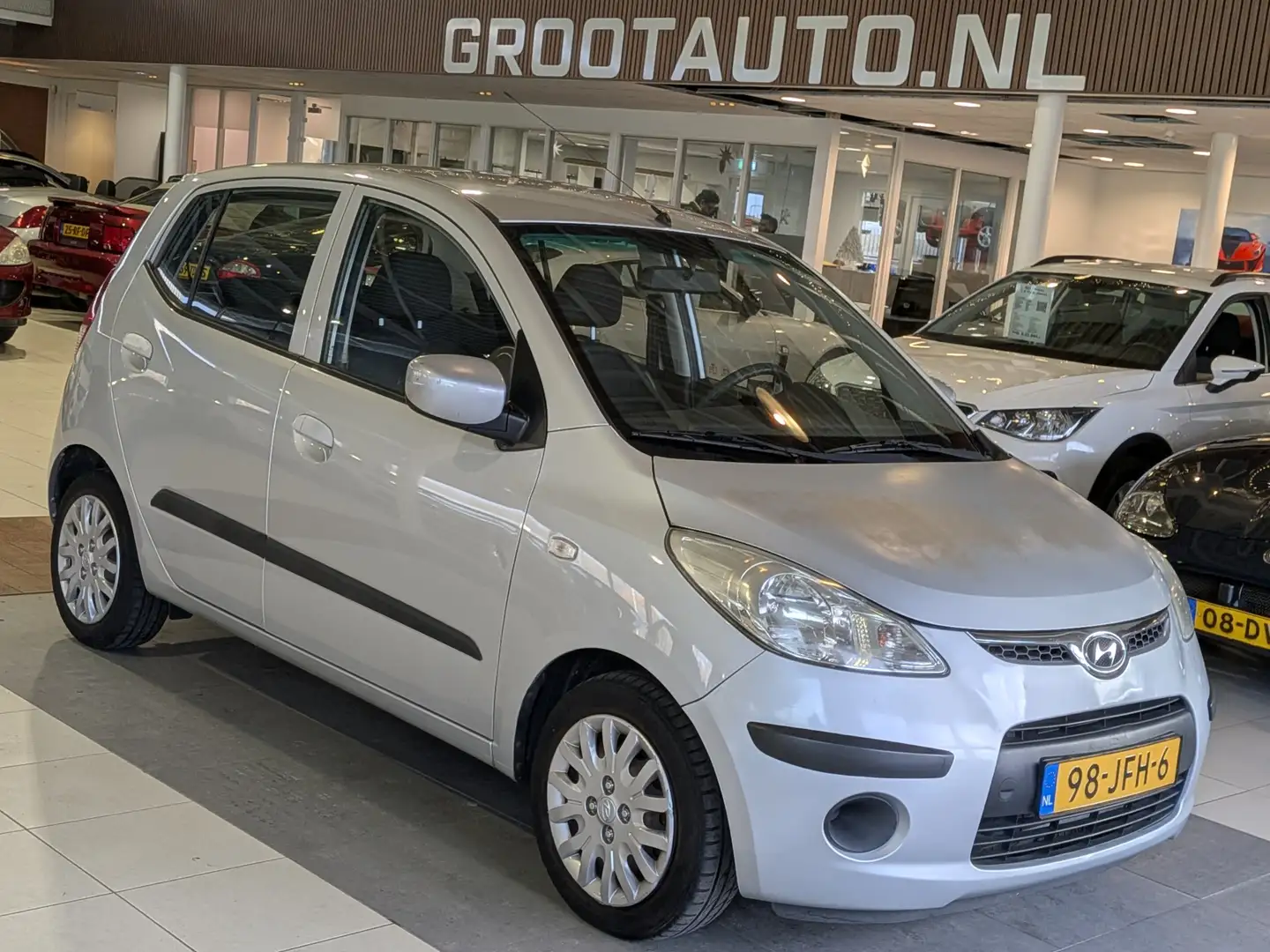 Hyundai i10 1.1 Dynamic Cool Airco, Stuurbekrachtiging Grigio - 1
