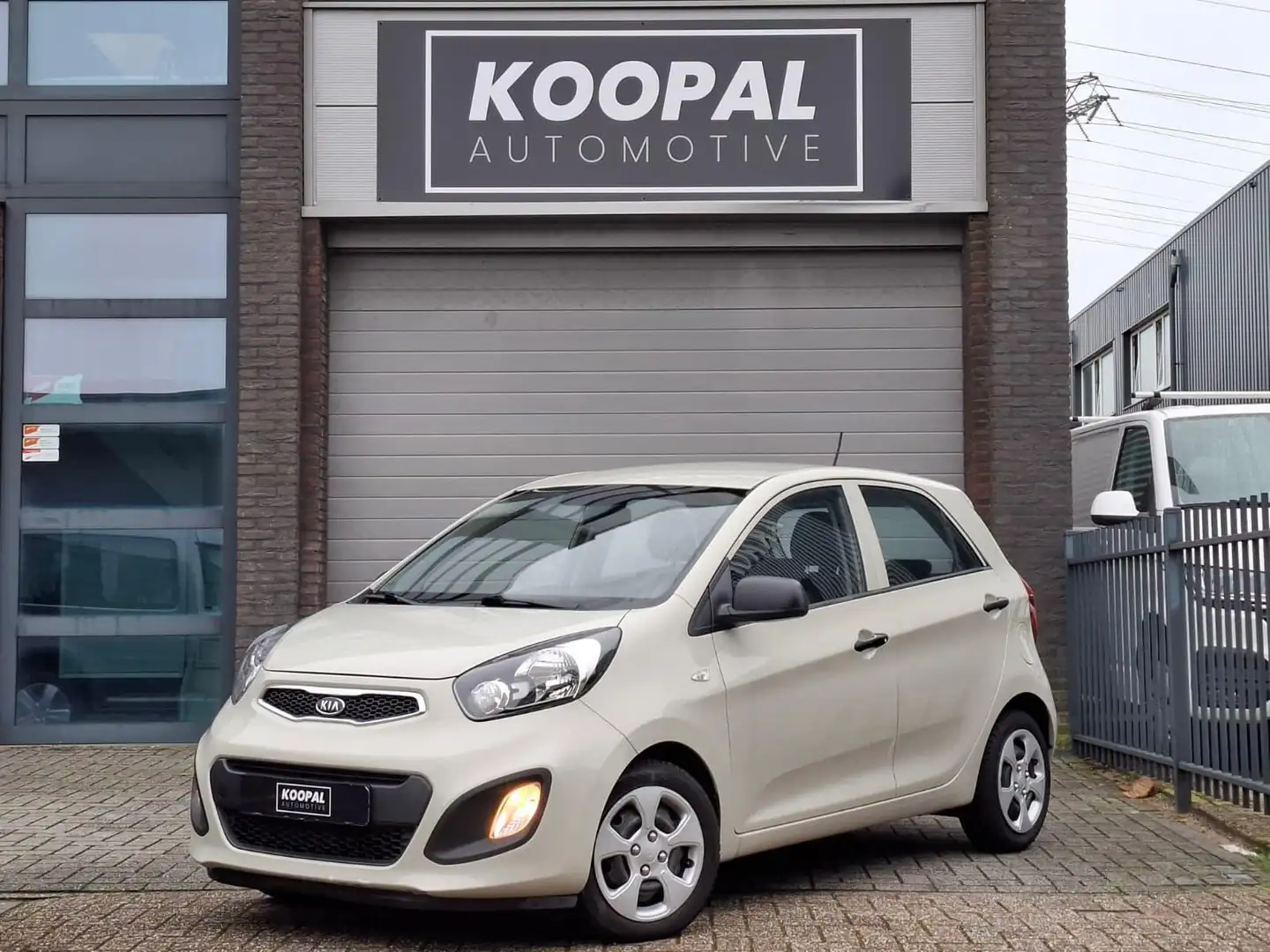 Kia Picanto 1.0 CVVT Comfort Pack | Airco | NAP | Dealer Onder Beige - 1