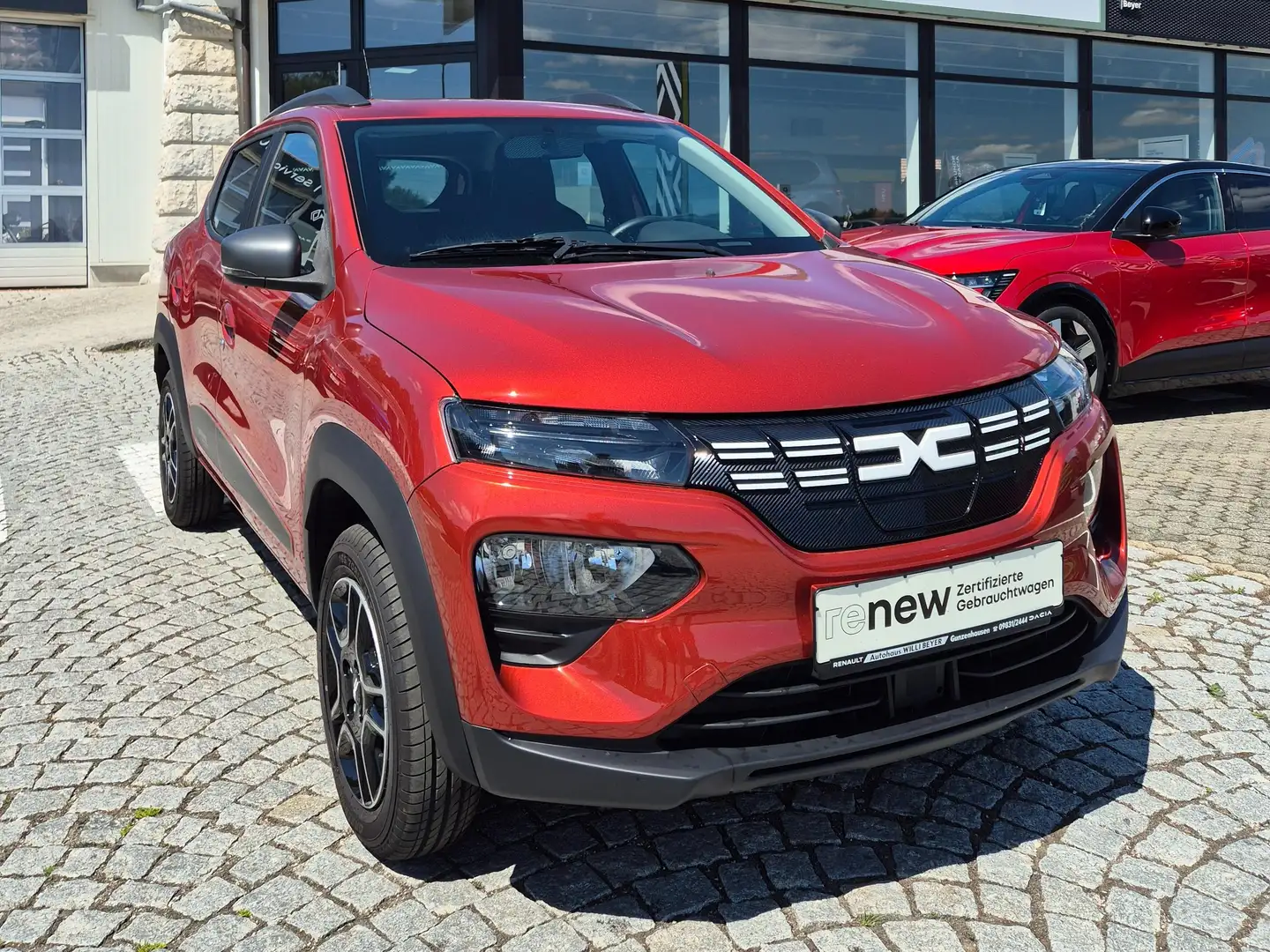 Dacia Spring Essential 45 mit Optionspaket Expression Rot - 1