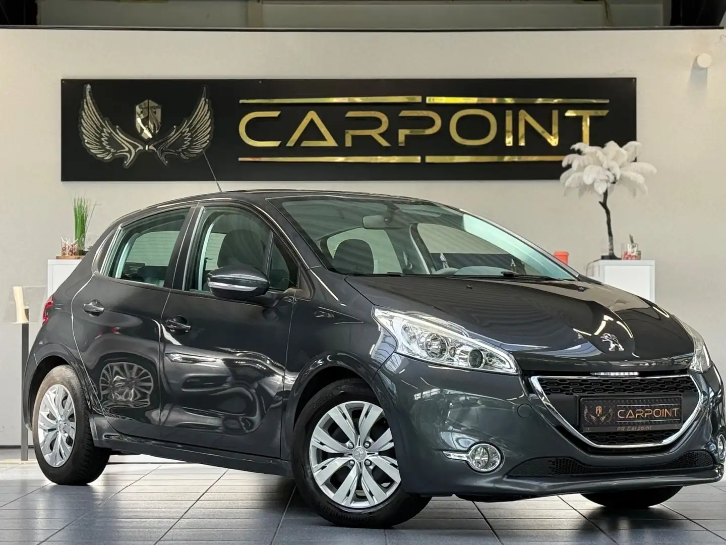 Peugeot 208 Active 1,4l /Bluetooth/Tempo./Klima Grau - 1