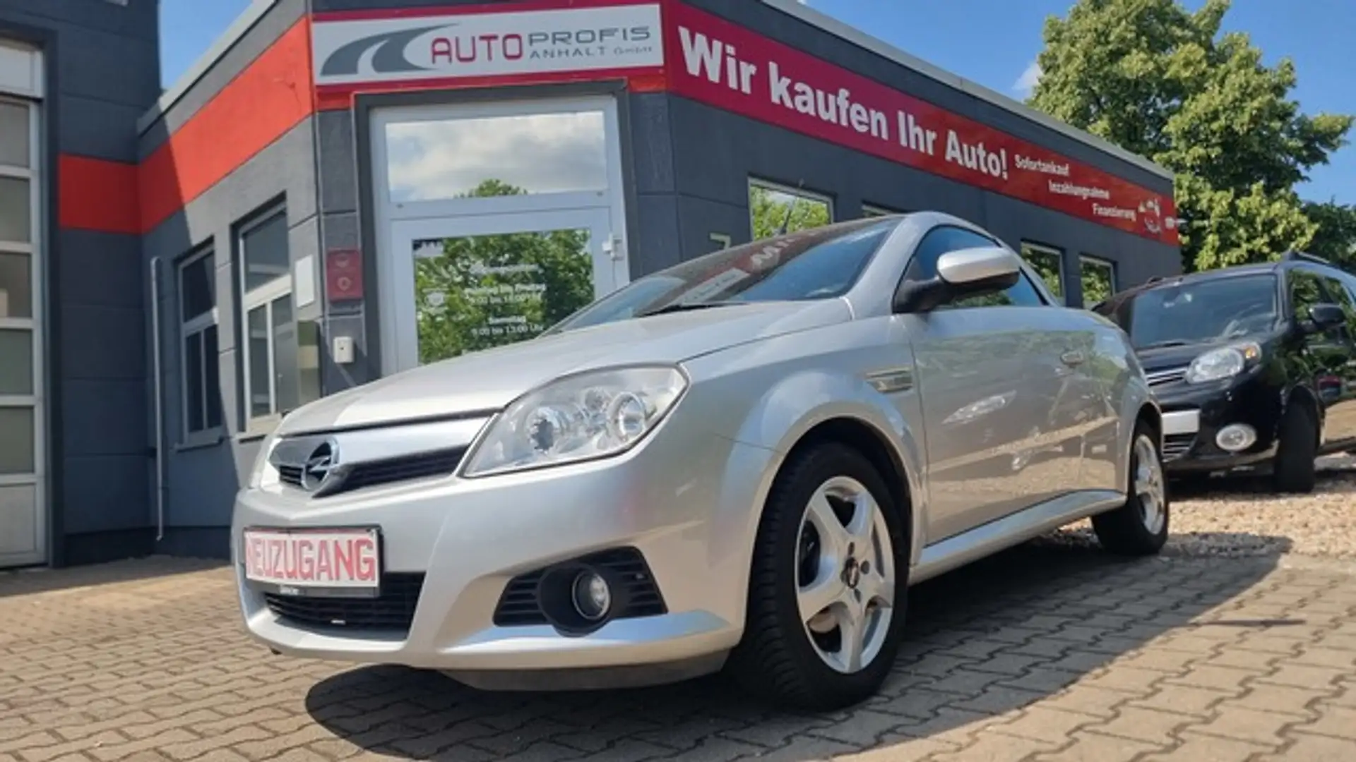 Opel Tigra TWINPORT ROADSTER COUPE 1,4 Easytronic Серебристый - 1