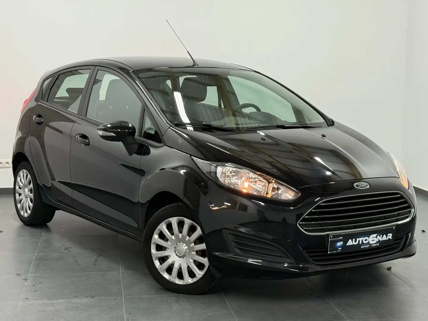 Ford Fiesta 1.25i Euro 5 - Airco - Carnet Noir - 1