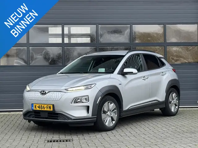 Hyundai KONA EV FASHION 64 KWH I 3 FASE I 100% SOH I P-CAMERA I