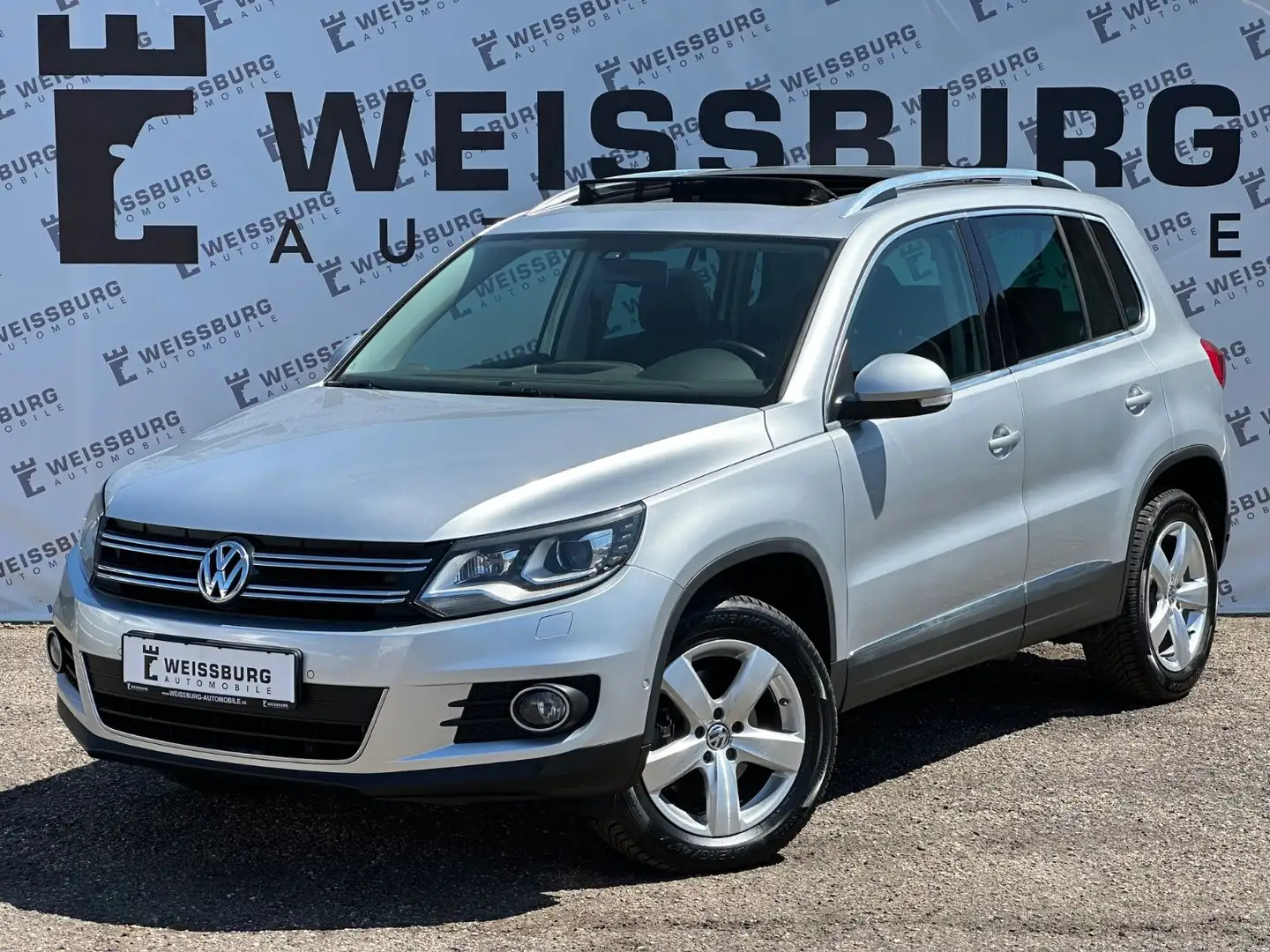 Volkswagen Tiguan Sport & Style BMT 4Motion PANO|XENON|AHK Plateado - 1