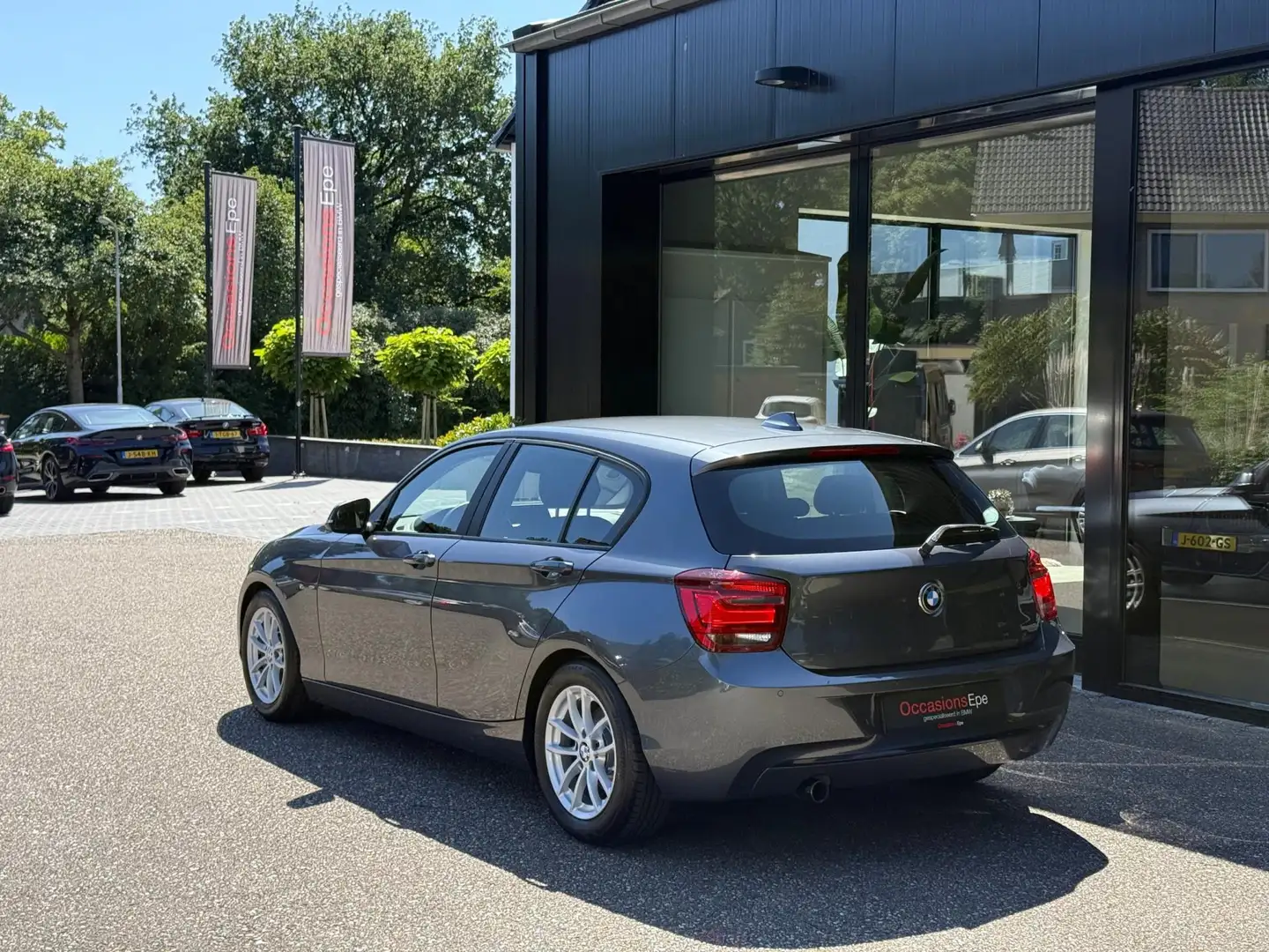 BMW 118 1-Serie 118i Sportline Edition Mineralgrau 85.000 Grijs - 2