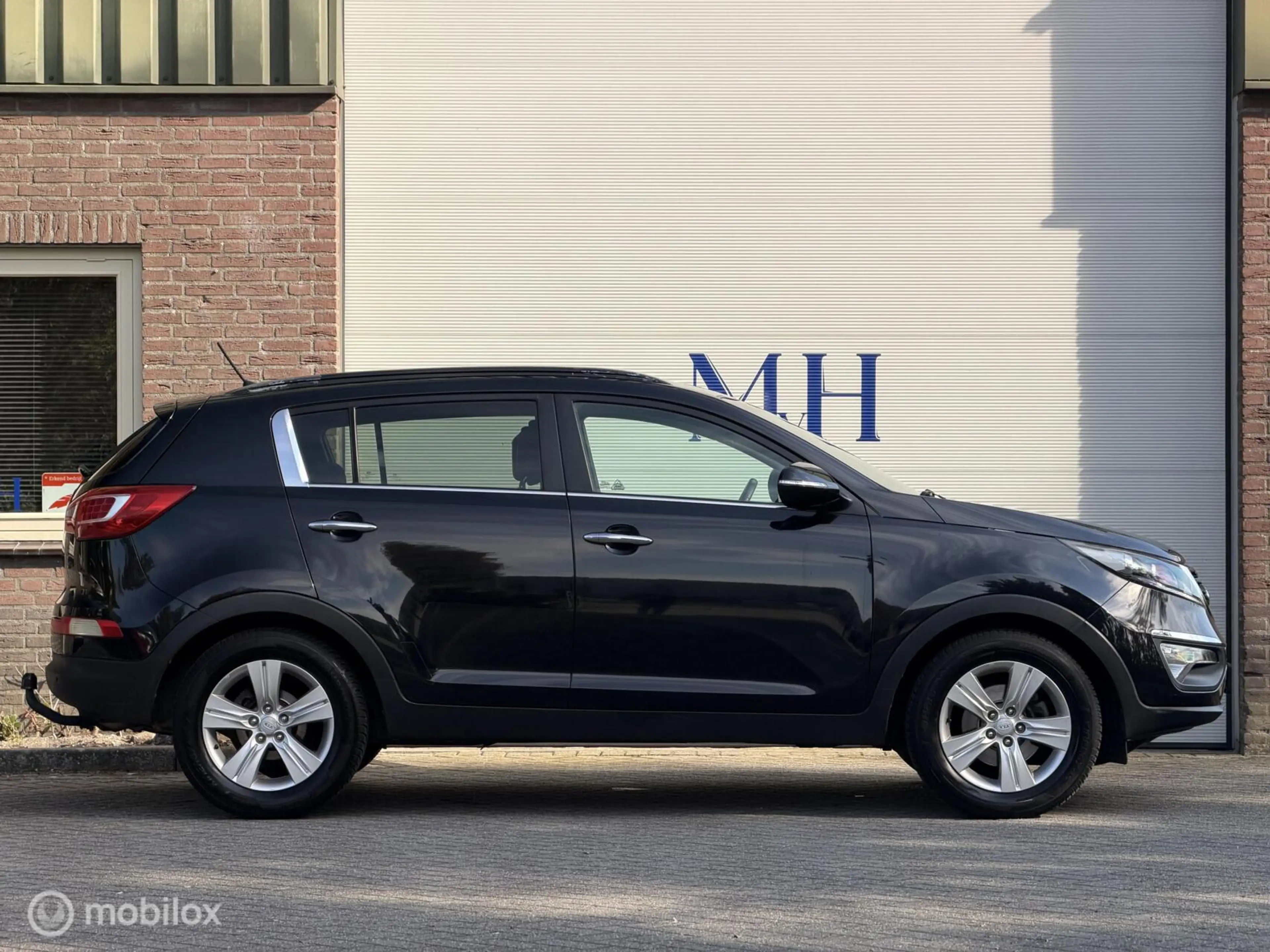 Kia Sportage 1.6 GDI Plus Pack ORG NED Trekhaak Climate Cruise — photo 8