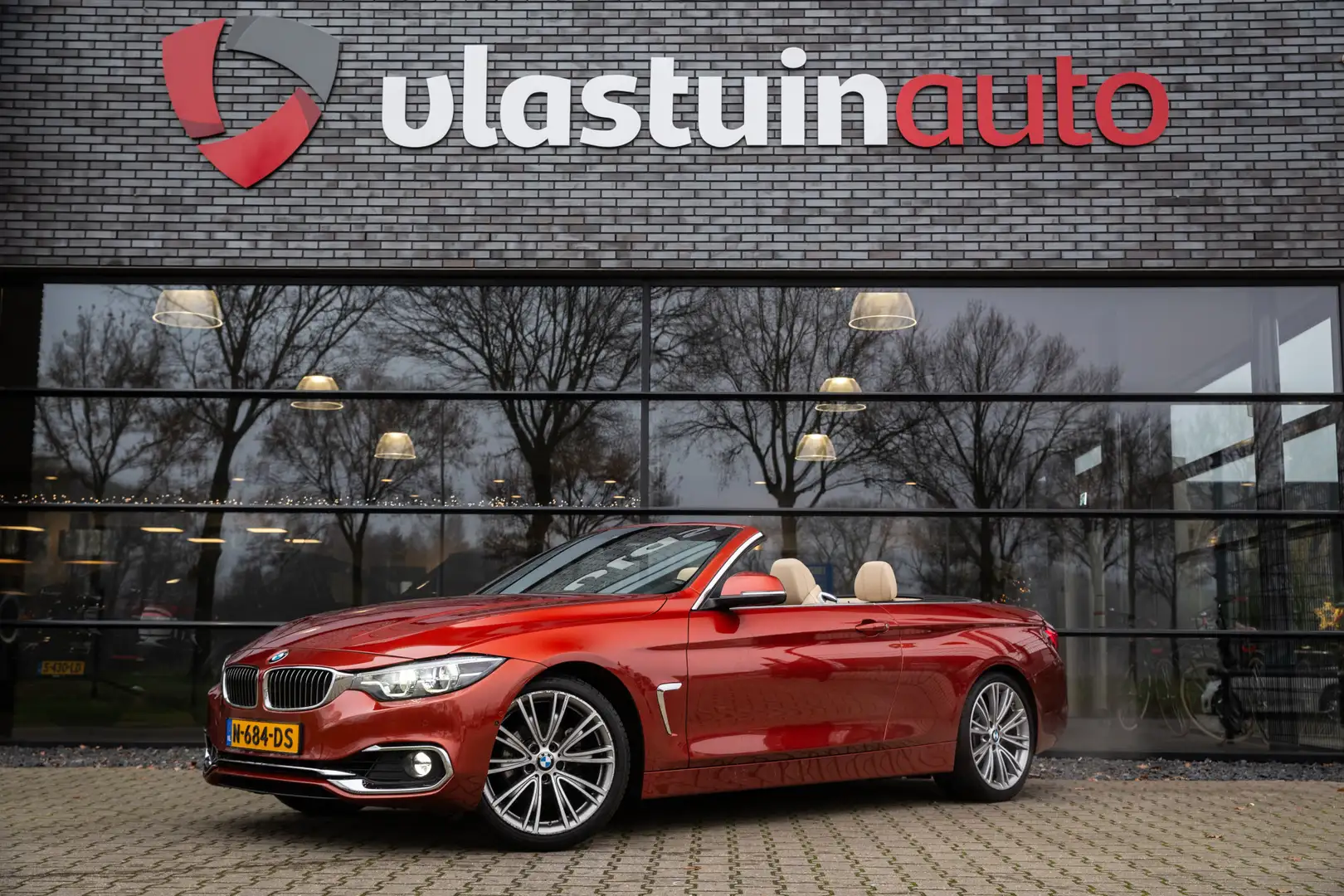 BMW 420 4-serie Cabrio 420i High Executive Luxury Oranje - 1