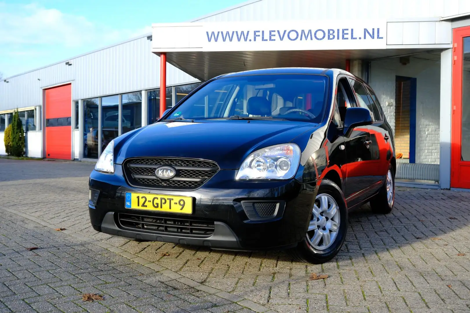 Kia Carens 2.0 CVVT X-tra Airco|LMV|1e Eigenaar! Noir - 1