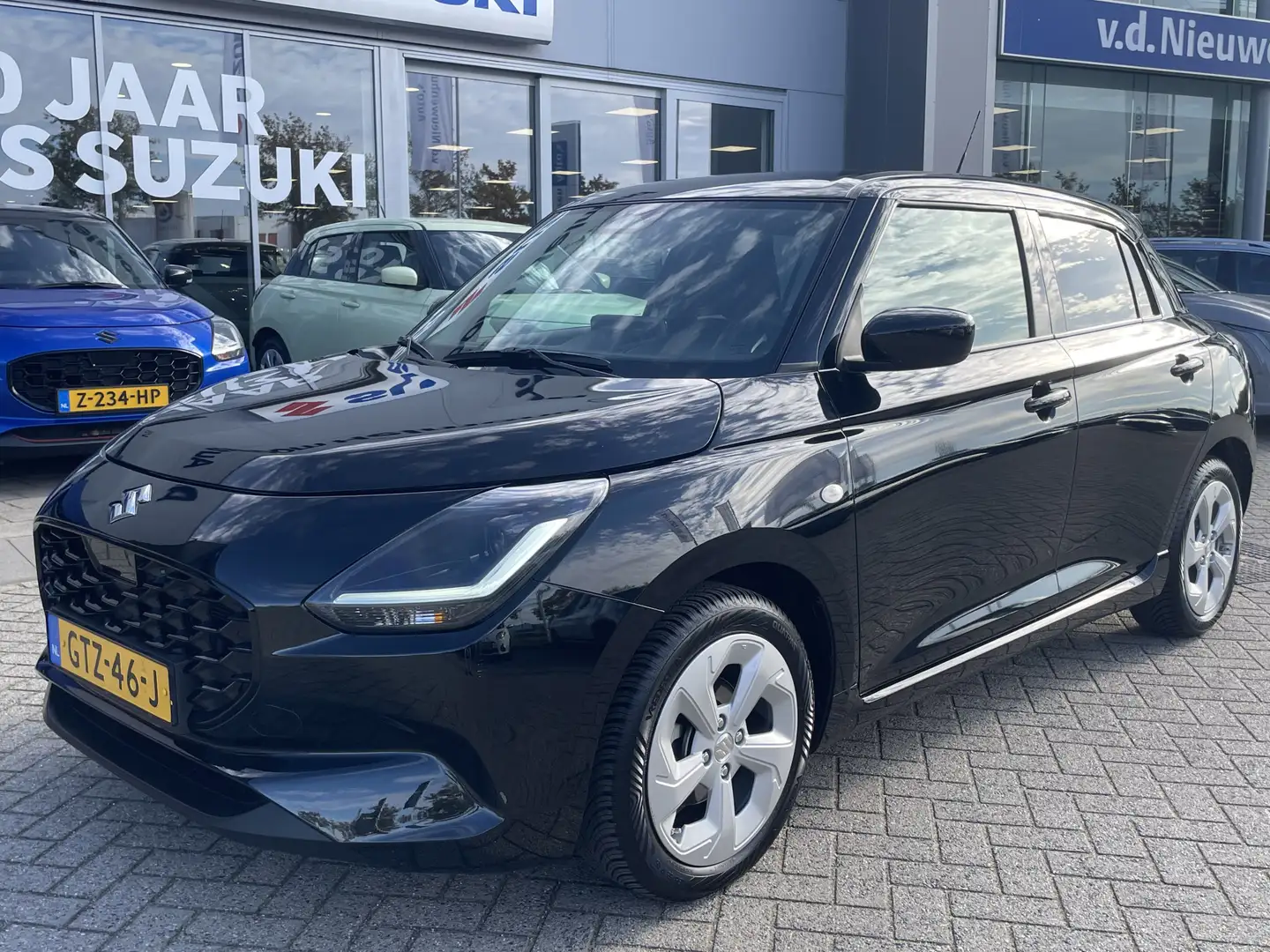 Suzuki Swift 1.2 Select Smart Hybrid | Adaptive cruise | Achter Zwart - 1