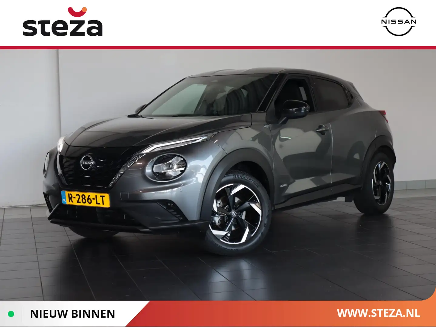 Nissan Juke 1.6 Hybrid N-Connecta | Trekhaak | Cruise control Grijs - 1