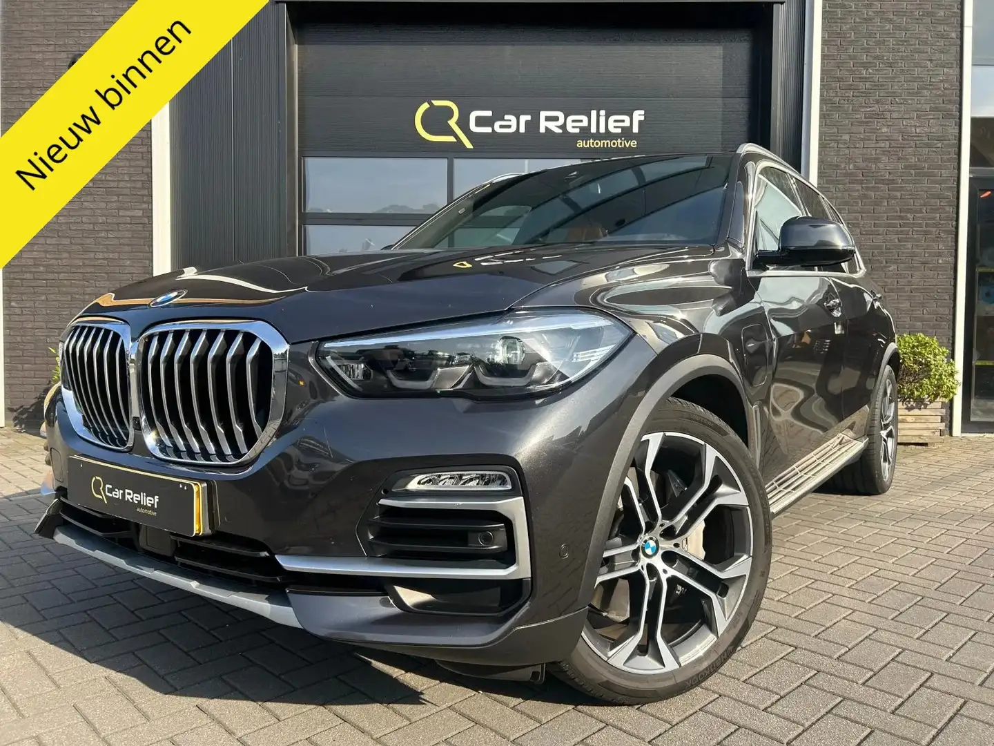 BMW X5 XDrive45e High Executive | Luchtvering | Pano | Me Grijs - 1
