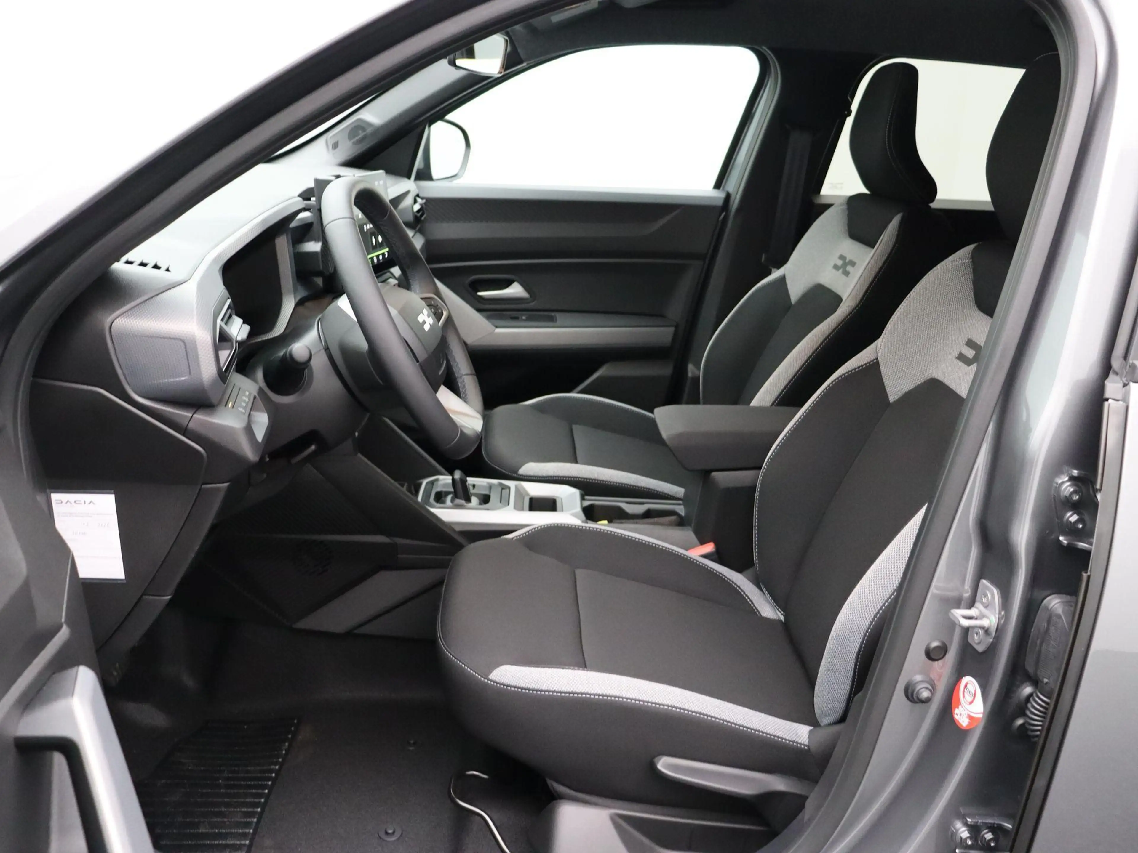 Dacia Duster 1.8 hybrid 155pk limited edition | Stoel- en stuur — photo 15