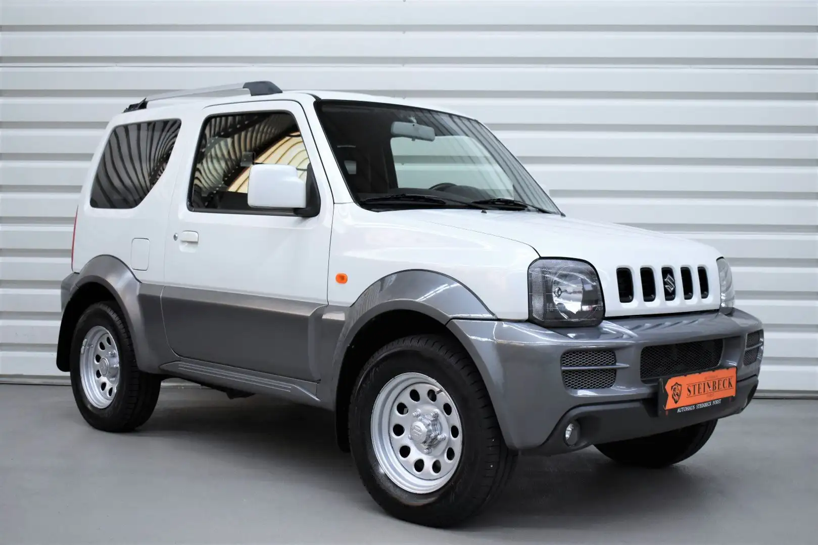 Suzuki Jimny Style+SHZ+AHK+Klima+49.500KM+Leder Weiß - 1