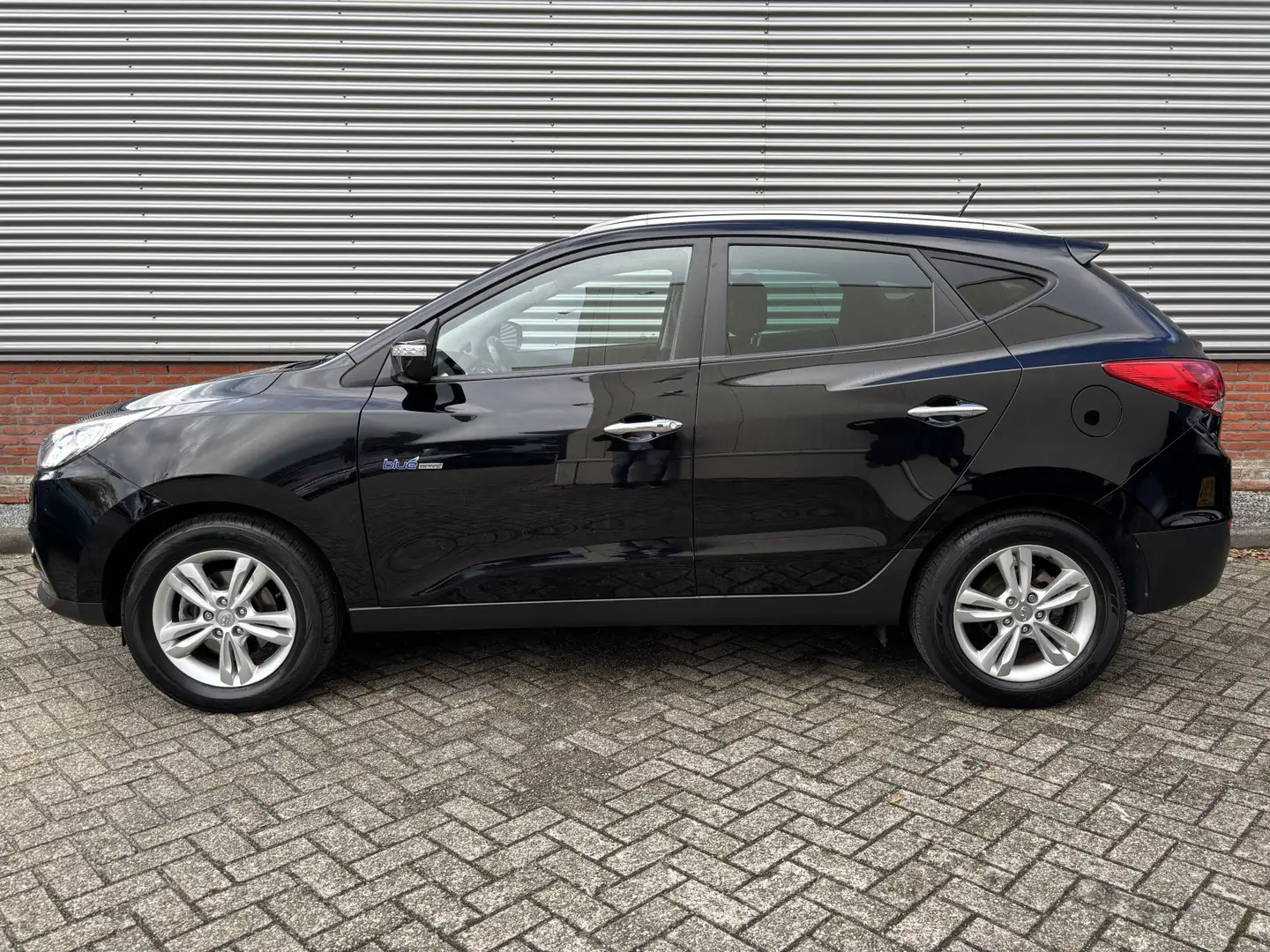 Hyundai iX35 1.6i GDI i-Magine | Navigatie | Camera | Stoelverw Zwart - 2