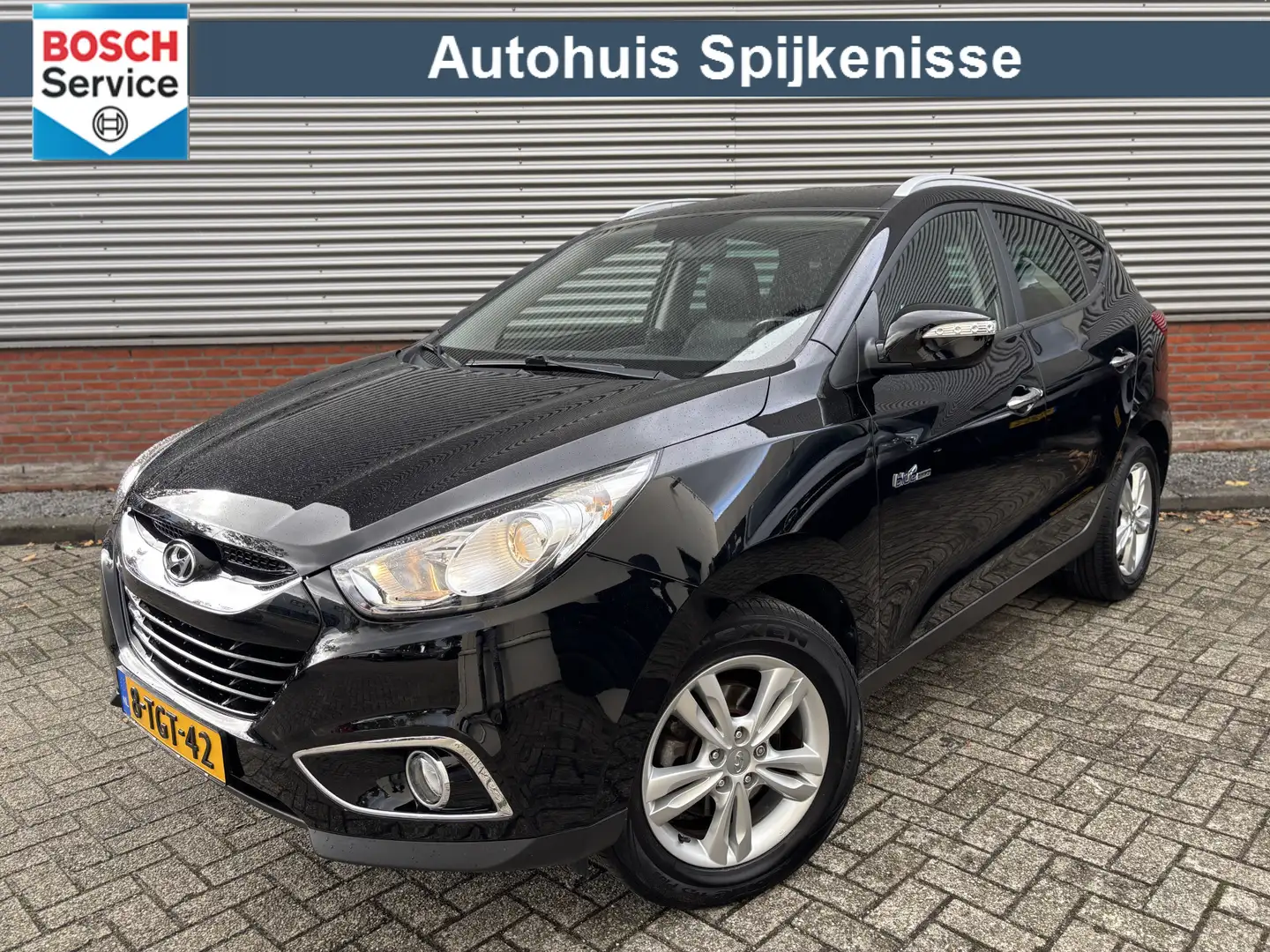 Hyundai iX35 1.6i GDI i-Magine | Navigatie | Camera | Stoelverw Zwart - 1