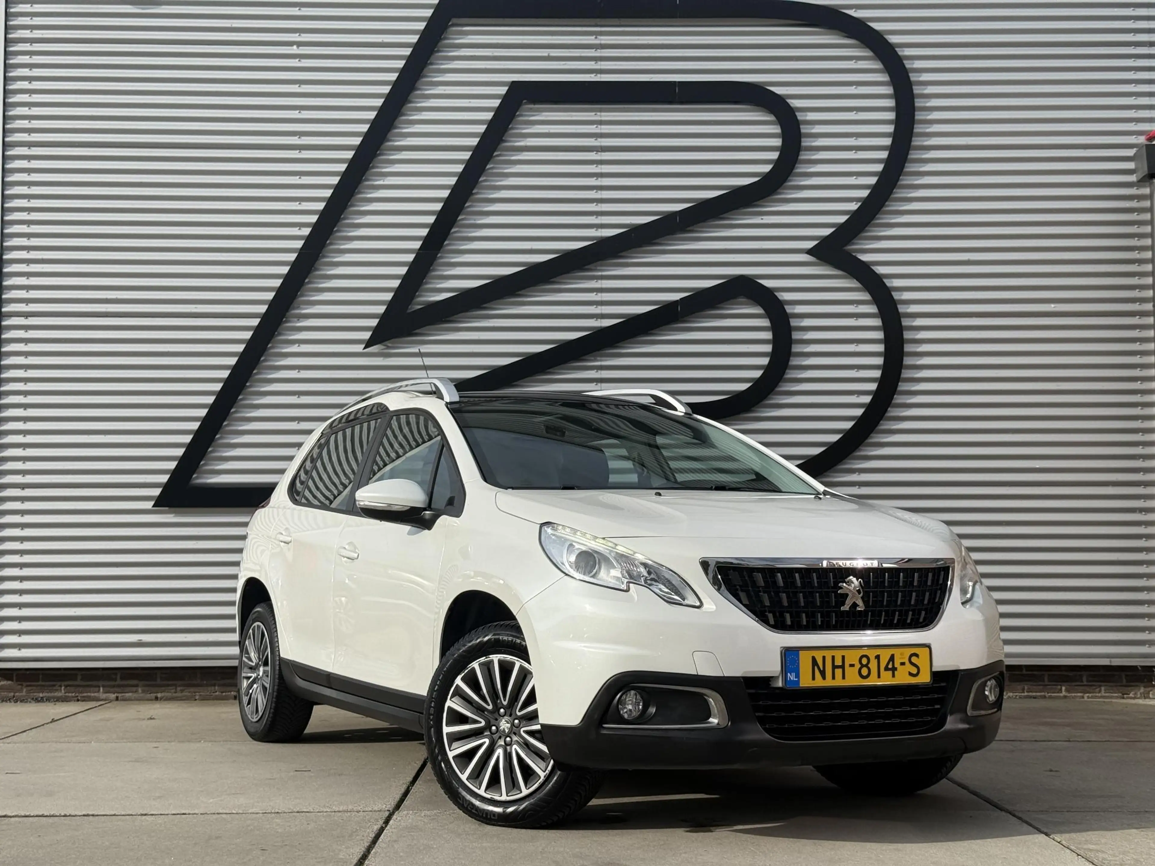 Peugeot 2008 1.2 PureTech Blue Lion 2e Eigenaar|Pano|Navi|Carpl — photo 7