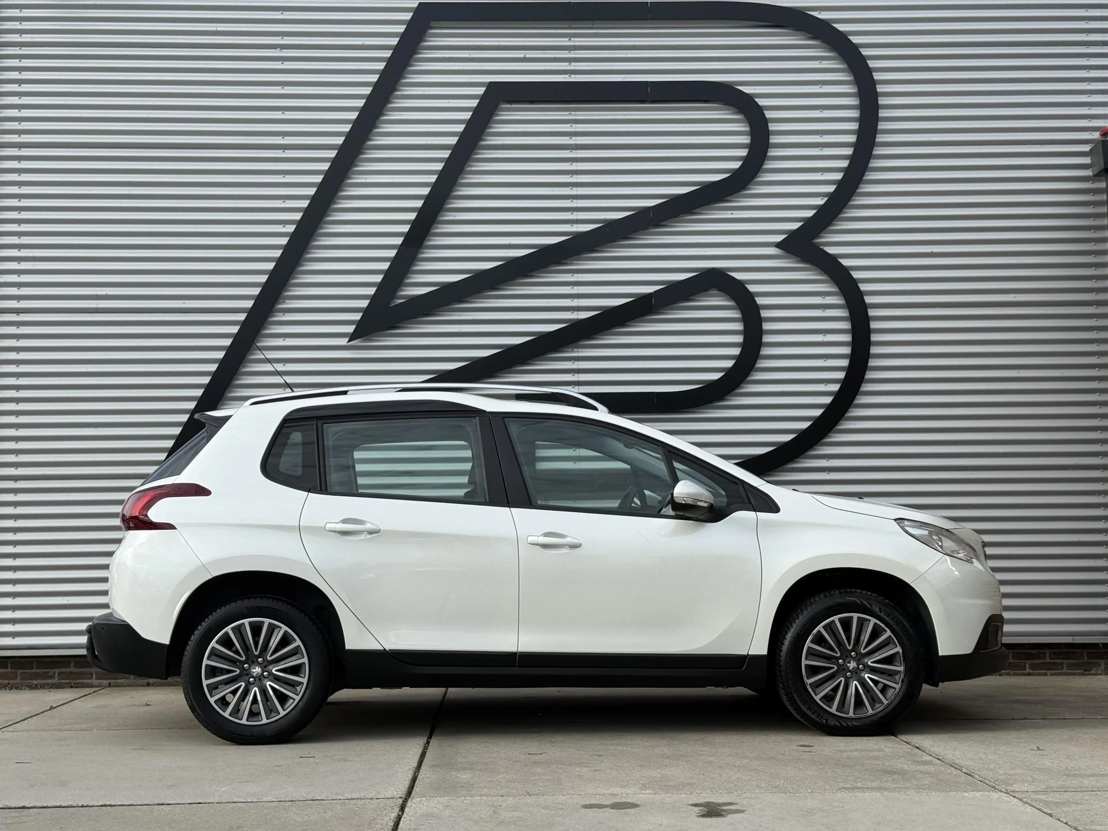Peugeot 2008 1.2 PureTech Blue Lion 2e Eigenaar|Pano|Navi|Carpl — photo 9