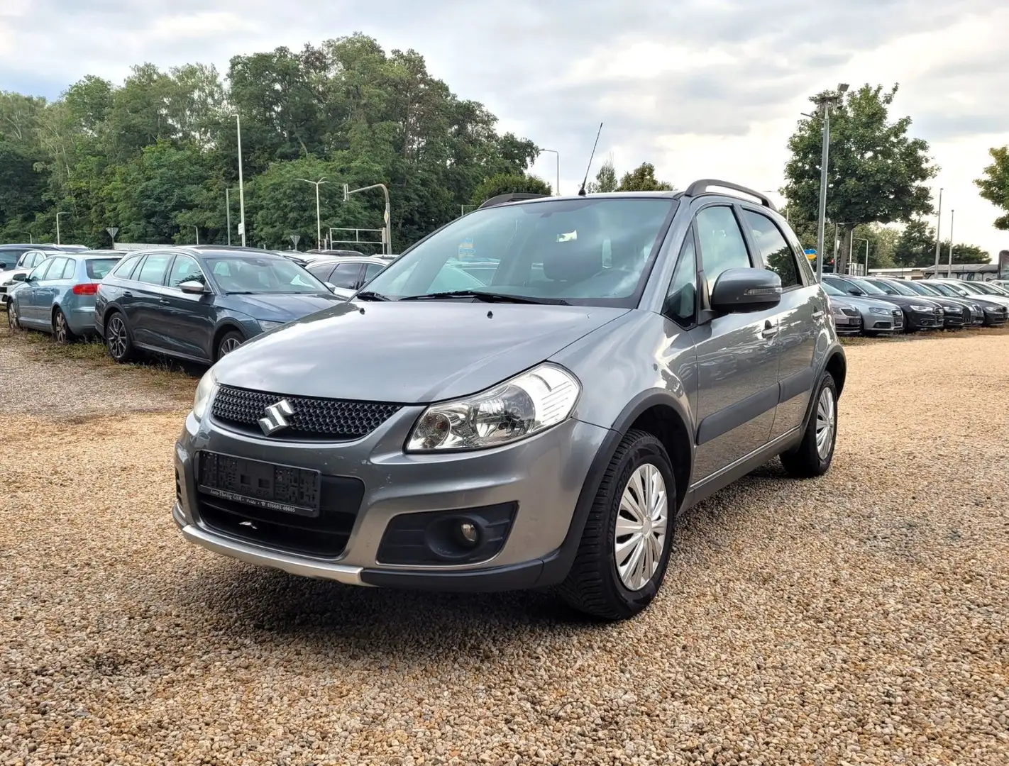 Suzuki SX4 Style 4x4 1.6*Navi*SZH*Klimaaut*M+S*Keyless* Gris - 1