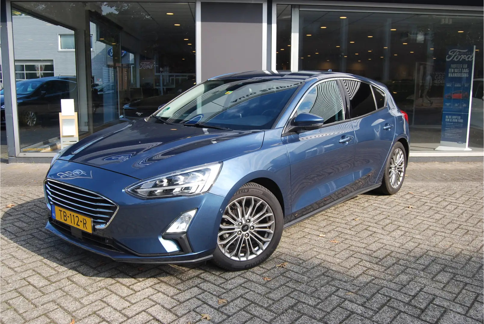 Ford Focus 1.0 EcoBoost 125pk Titanium 5DRS | NL-AUTO | TREKH Blau - 2