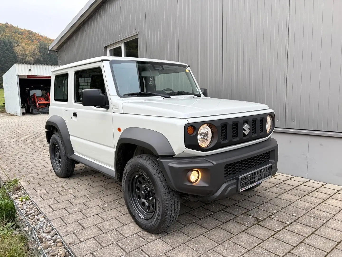 Suzuki Jimny Comfort AllGrip NEUWERTIG Weiß - 1