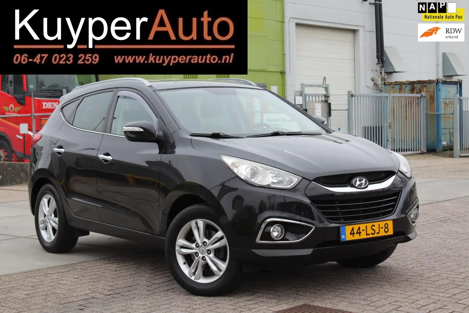 Hyundai iX35 2.0i Style NAP CLIMA -CRUISE/ HALF LEDER Zwart - 1