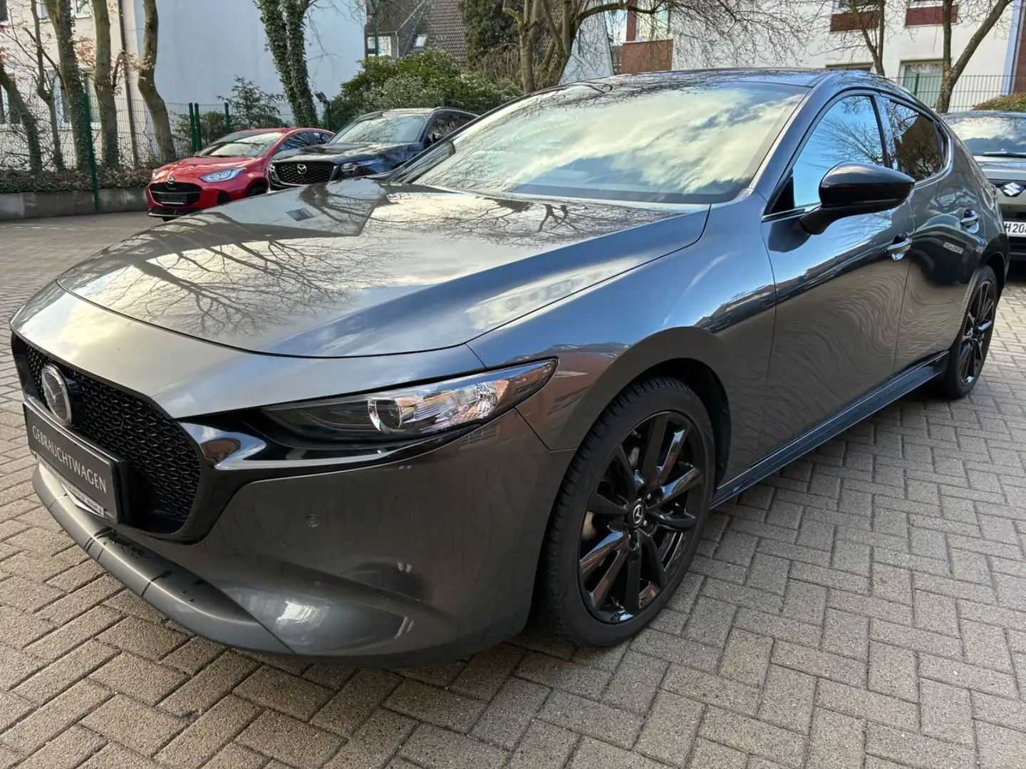 Mazda 3 SKYACTIV-X 2.0 M Hybrid 6AG AL-HOMURA PREM-PAK Grau - 1