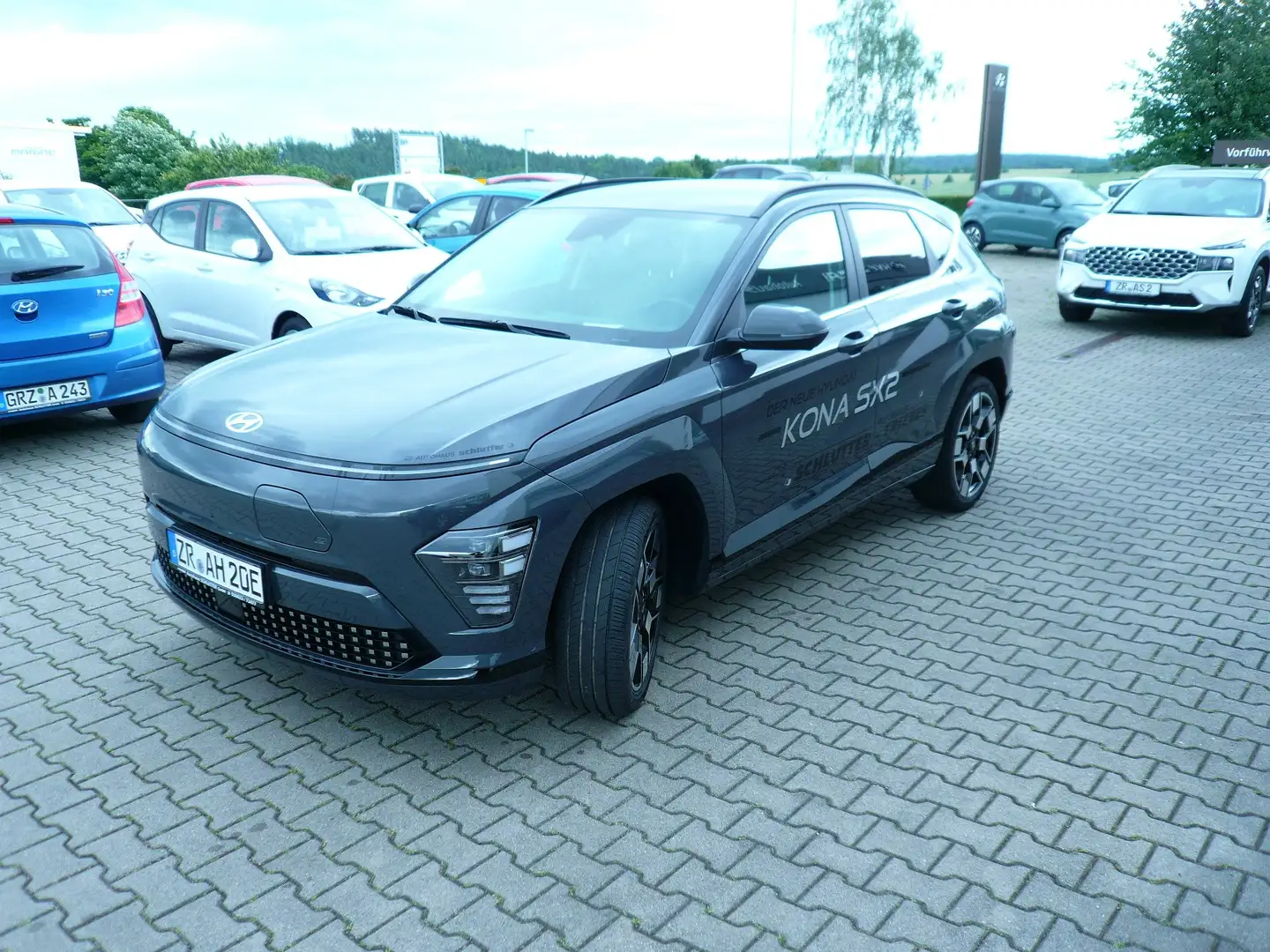 Hyundai KONA E Prime BOSE Leder 19" 65,4Kw/h VOLLAUSSTATTUG Grau - 1