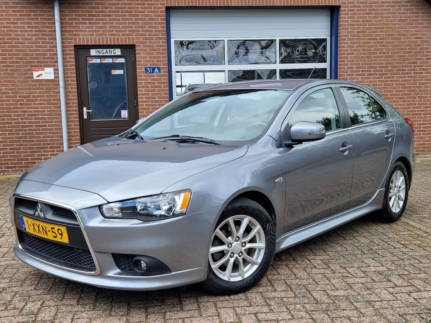 Mitsubishi Lancer Sportback 1.6 Limited Edition NL-auto Climate Crui Gris - 1