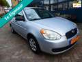 Hyundai ACCENT 1.4i Dynamic 97pk Sedan Airco Trekhaak 1100kg. 1e Grau - thumbnail 1