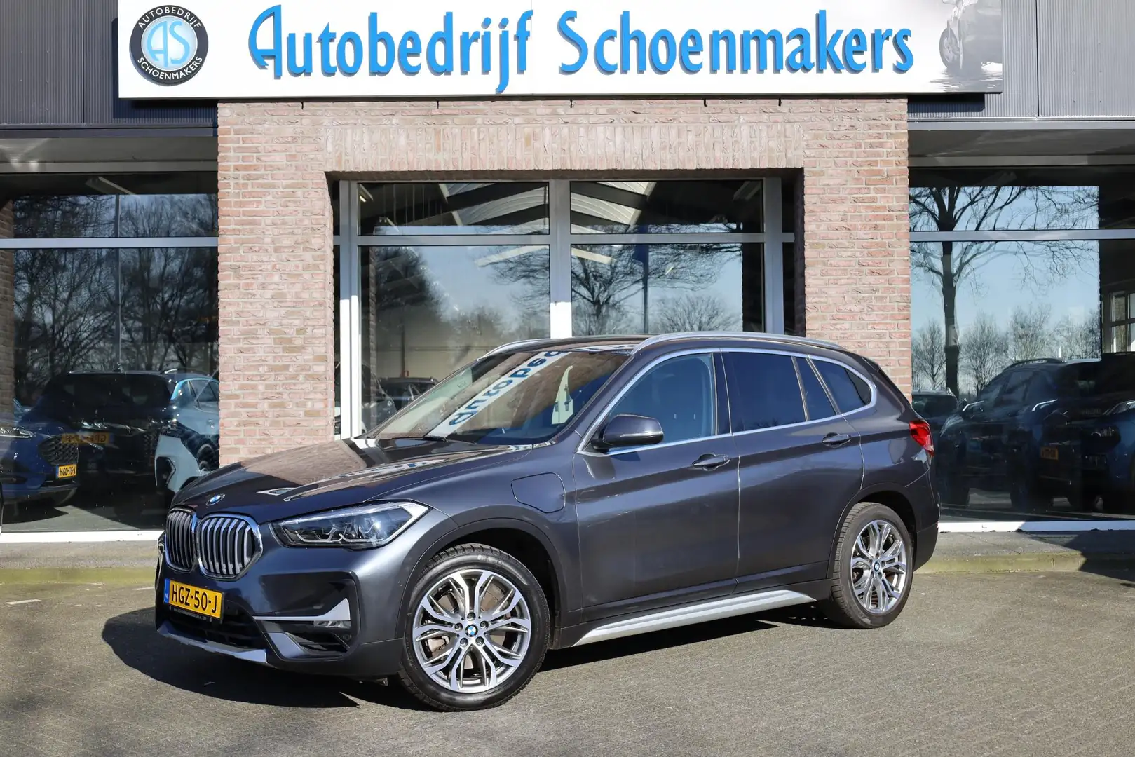 BMW X1 xDrive25e High Executive Edition PLUG-IN! LEER TRE Grijs - 1