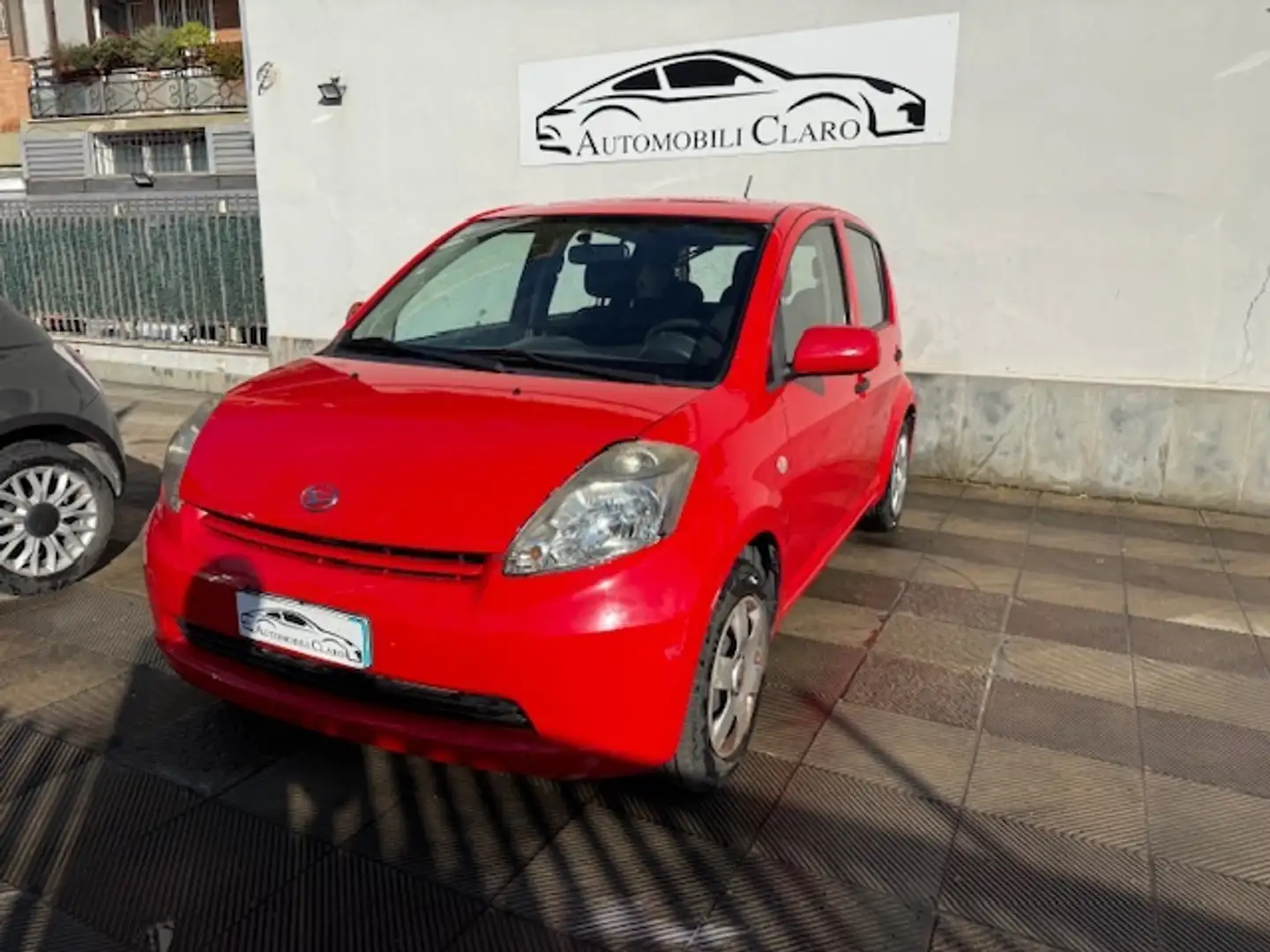Daihatsu Sirion Sirion 1.0 Aki Rosso - 1