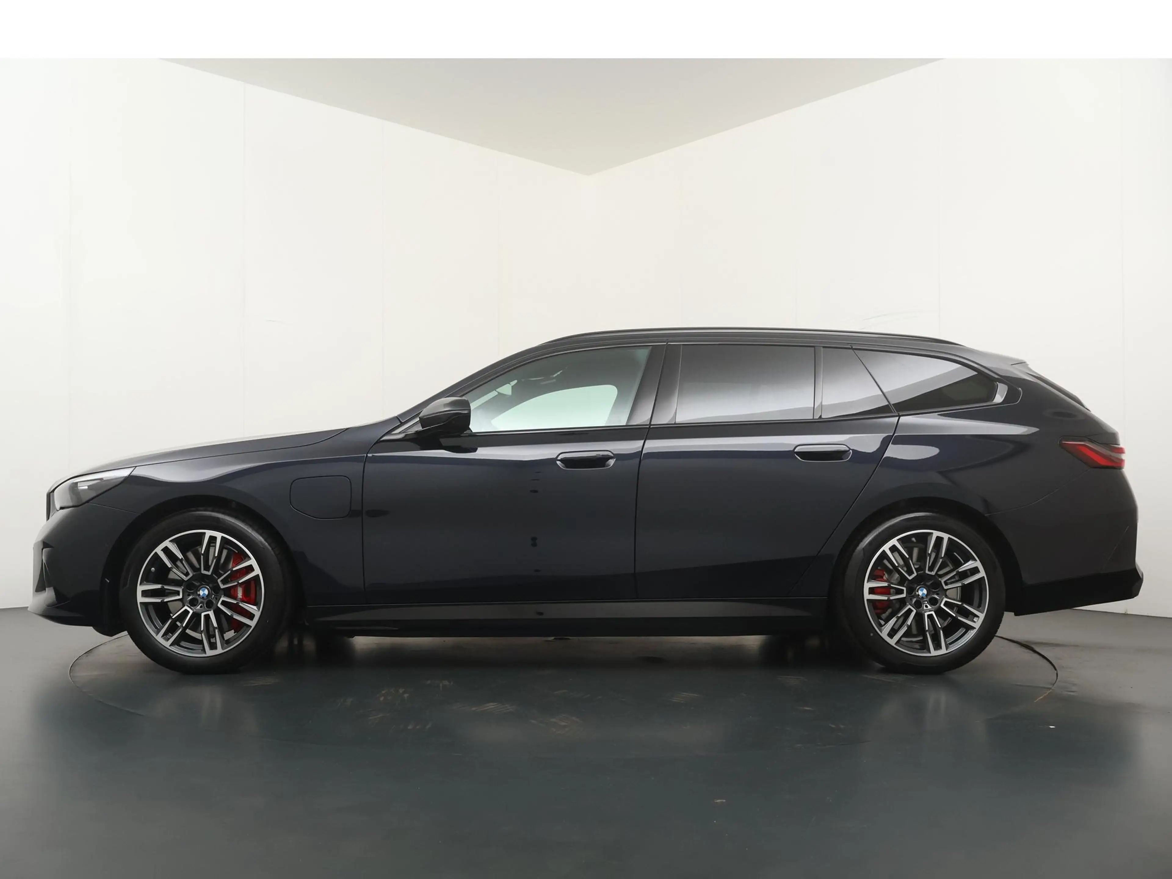 BMW 550 5-serie Touring 550e xDrive M Sport Pro | Panorama — photo 12