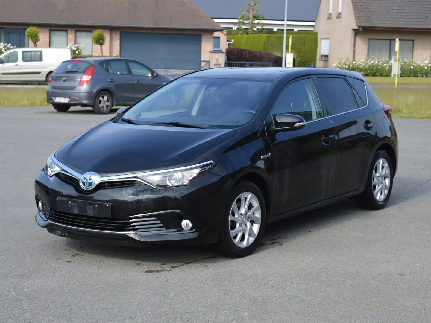 Toyota Auris 1.8 HYBRIDE  HSD Comfort Zwart - 1