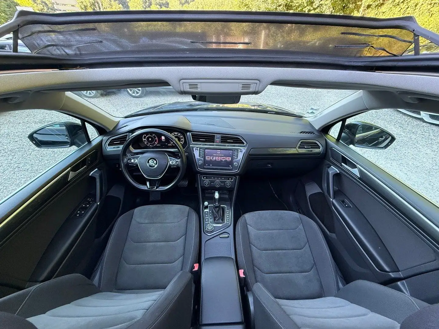 Volkswagen Tiguan 2.0 TDi 150cv 4Motion DSG7 Carat 2e main Noir - 2