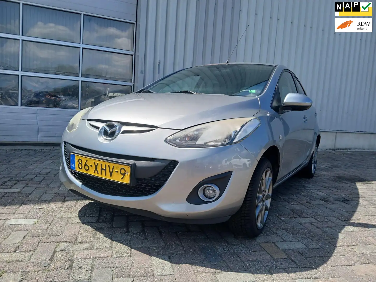 Mazda 2 1.3 Navigator GT - Airco - Navi - Schade Grijs - 1