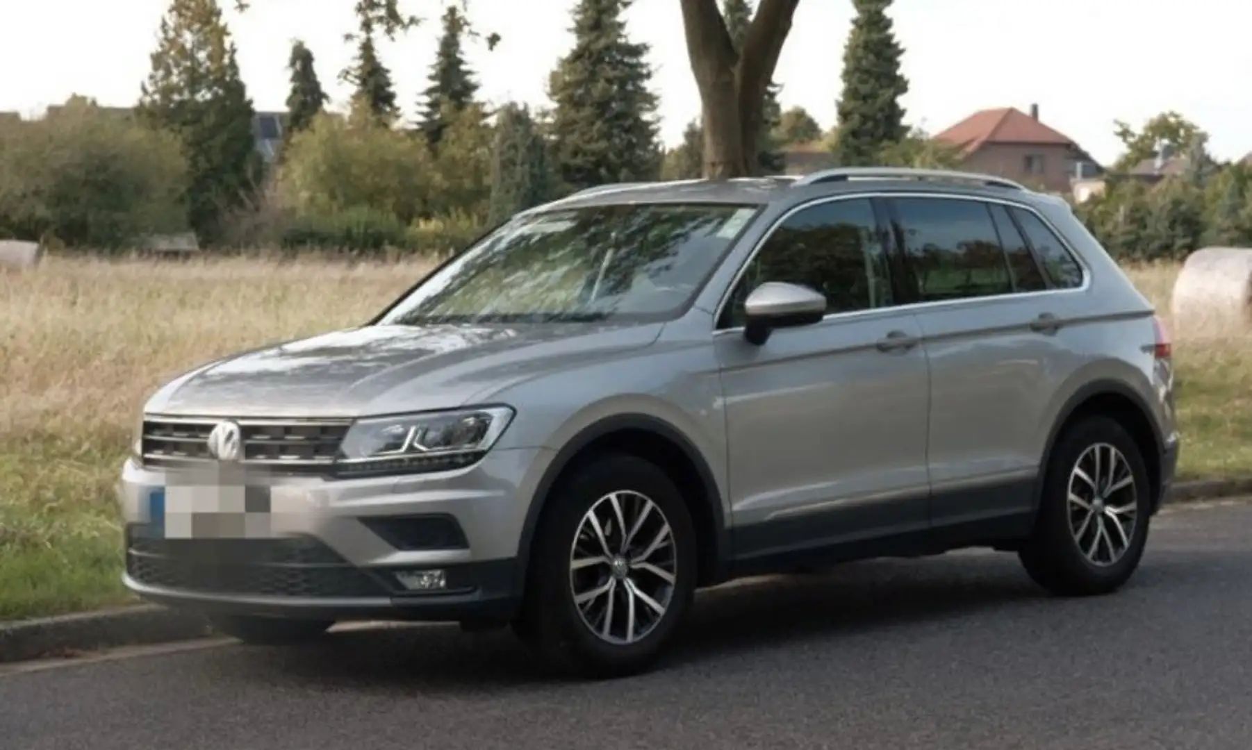 Volkswagen Tiguan 1.5 TSI ACT OPF Comfortline Bronze - 1