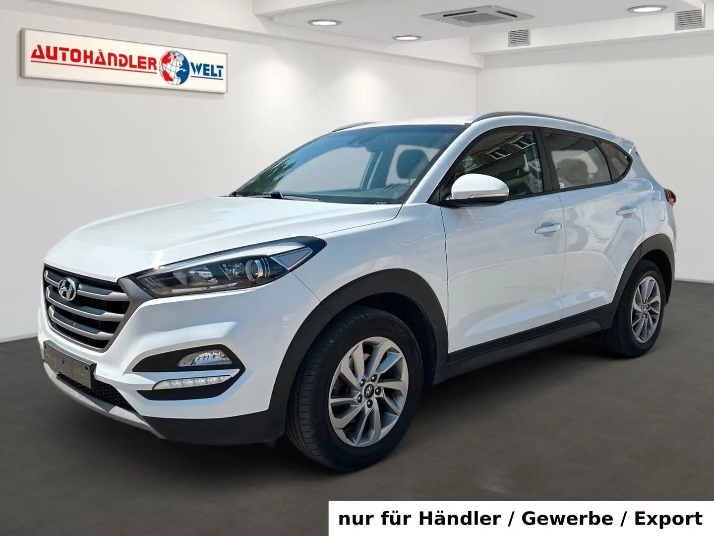 Hyundai TUCSON 1.6i 4WD Automatik AAC Navi SHZ PDC Weiß - 1
